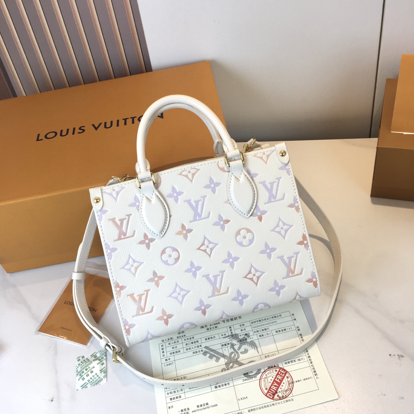 Louis Vuitton OnTheGo Small Handbag Monogram Empreinte Leather Gradient