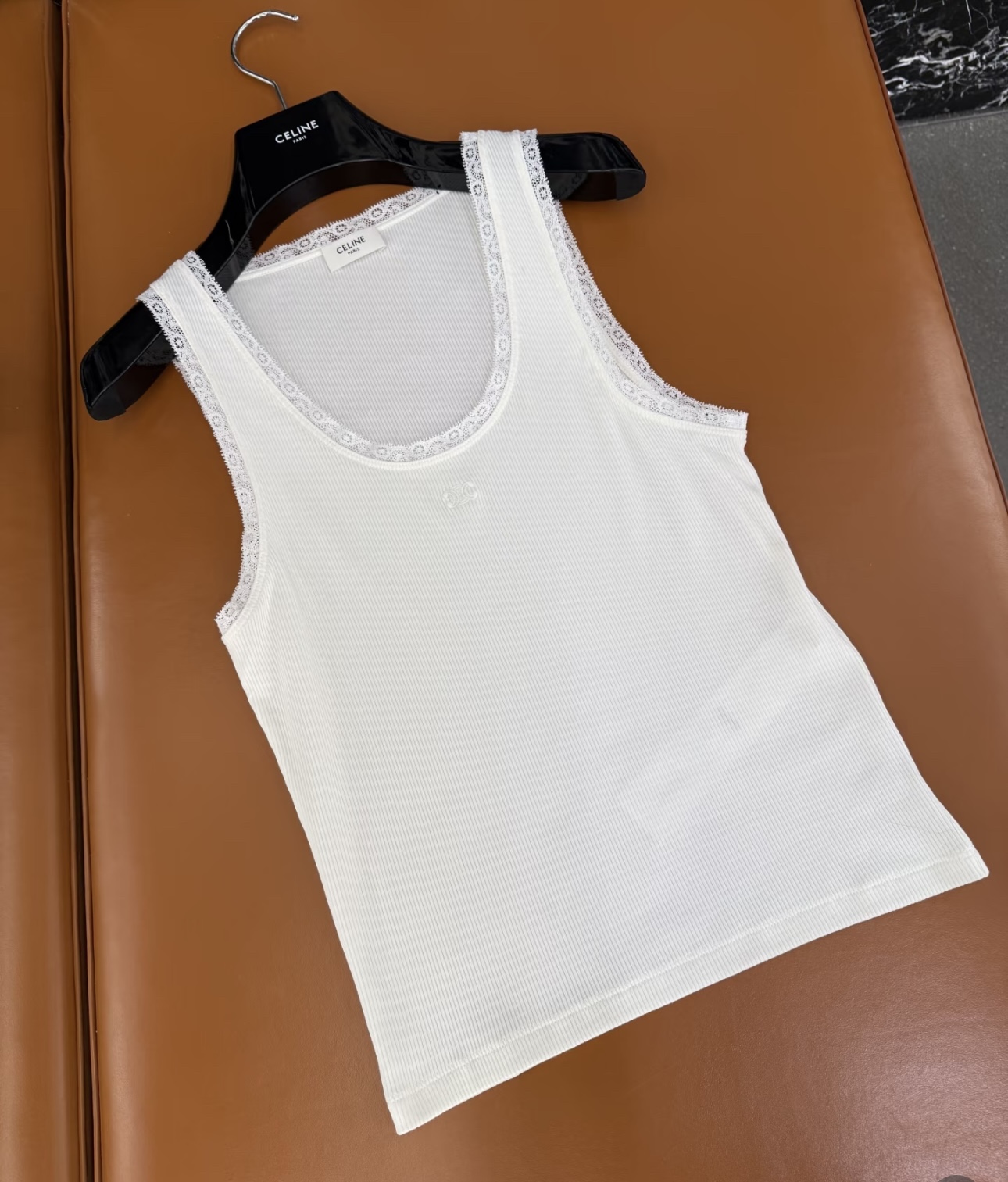 NO:536523,Celin* 25 new style white spliced ​​lace lace vest. Original development!  High-end production!  The embroidered logo of Arc de Triomphe is so beautiful!  You can wear it alone or as a base. It is super inclusive and must-have for matching autumn and winter. S/M/L is available in stock, celine, alexander wang19860909Celin* 25新款 白色拼接蕾丝花边背心.原版开发！高版出品！凯旋门刺绣logo美爆了！单穿或者作为打底都可以.包容性超级强 秋冬做搭配必备小单品.现货发售S/M/L,,celine,alexander wang,Women's clothing