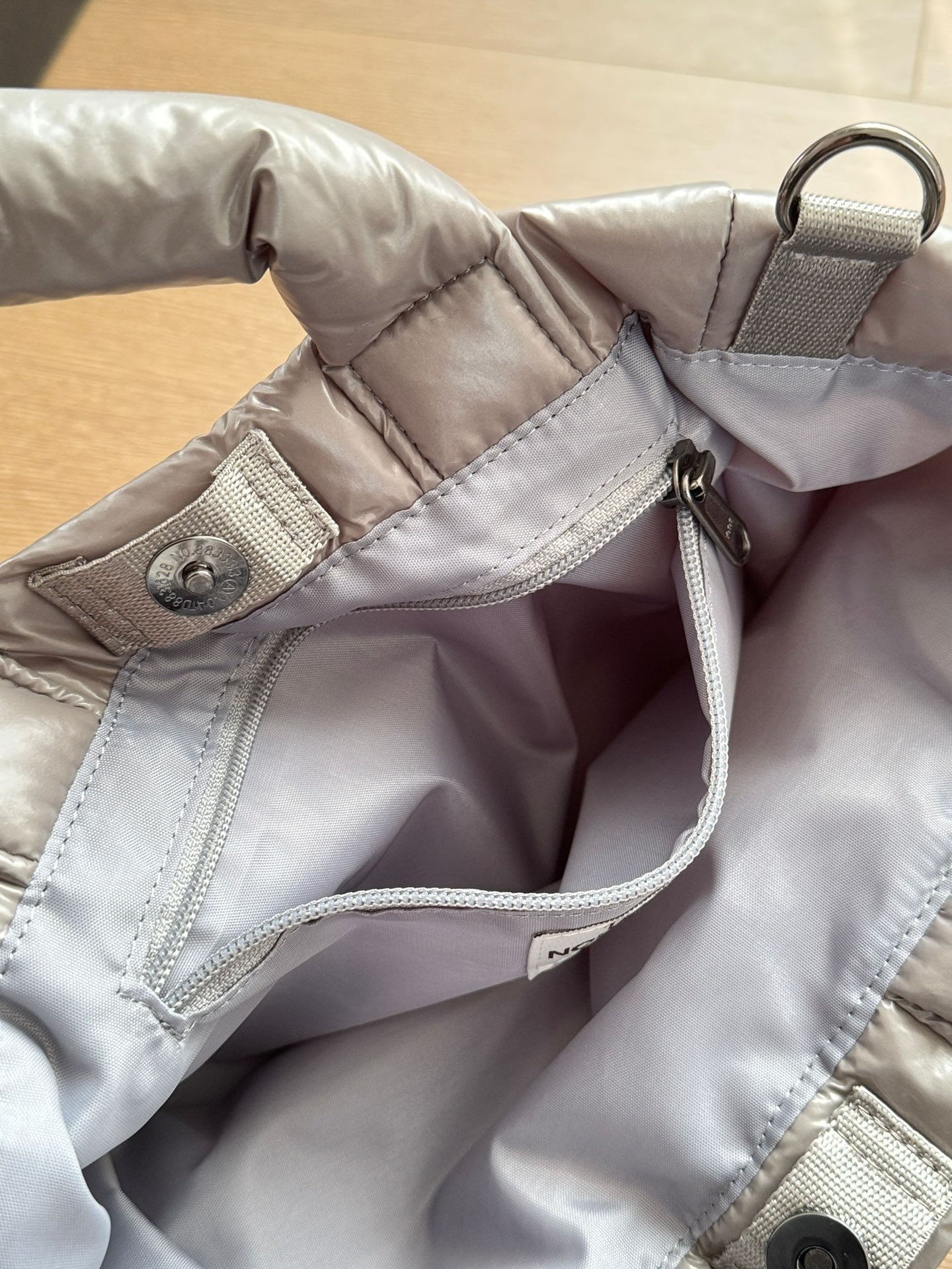 Featuring a generous interior capacity, this bag is secured with a - Comprehensive 4