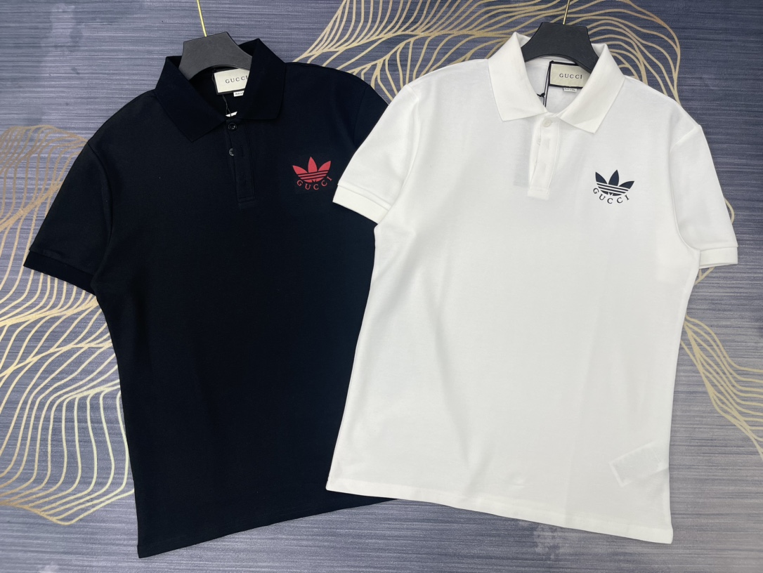 Luxus kaufen 2024
 Gucci Kleidung Polo Sale Outlet online
 Schwarz Weiß Drucken Unisex Frühling/Sommer Kollektion Fashion