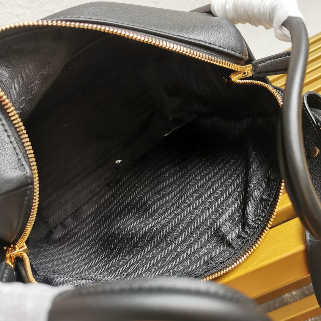 PRADA Bowling Bag 1BA451 Soft Grain Leather Shoulder Bag, Top Handle, and Crossbody 9 a1741589982795 8080