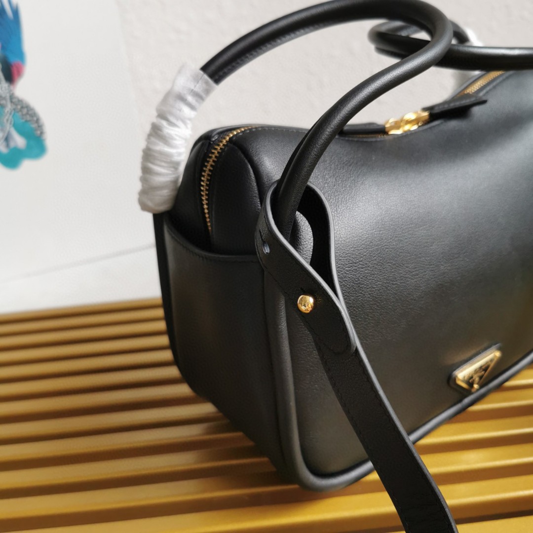PRADA Bowling Bag 1BA451 Soft Grain Leather Shoulder Bag, Top Handle, and Crossbody 8 a1741589982804 1331