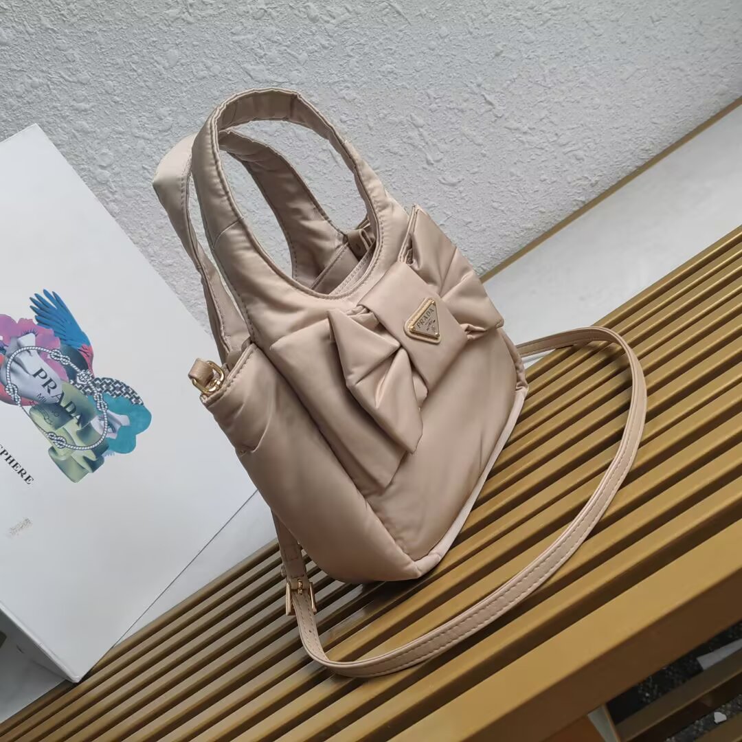 PRADA 1BA359 Small Basket Bag in Beige Nylon with Oversized Bow 3 a1744262302047 8176