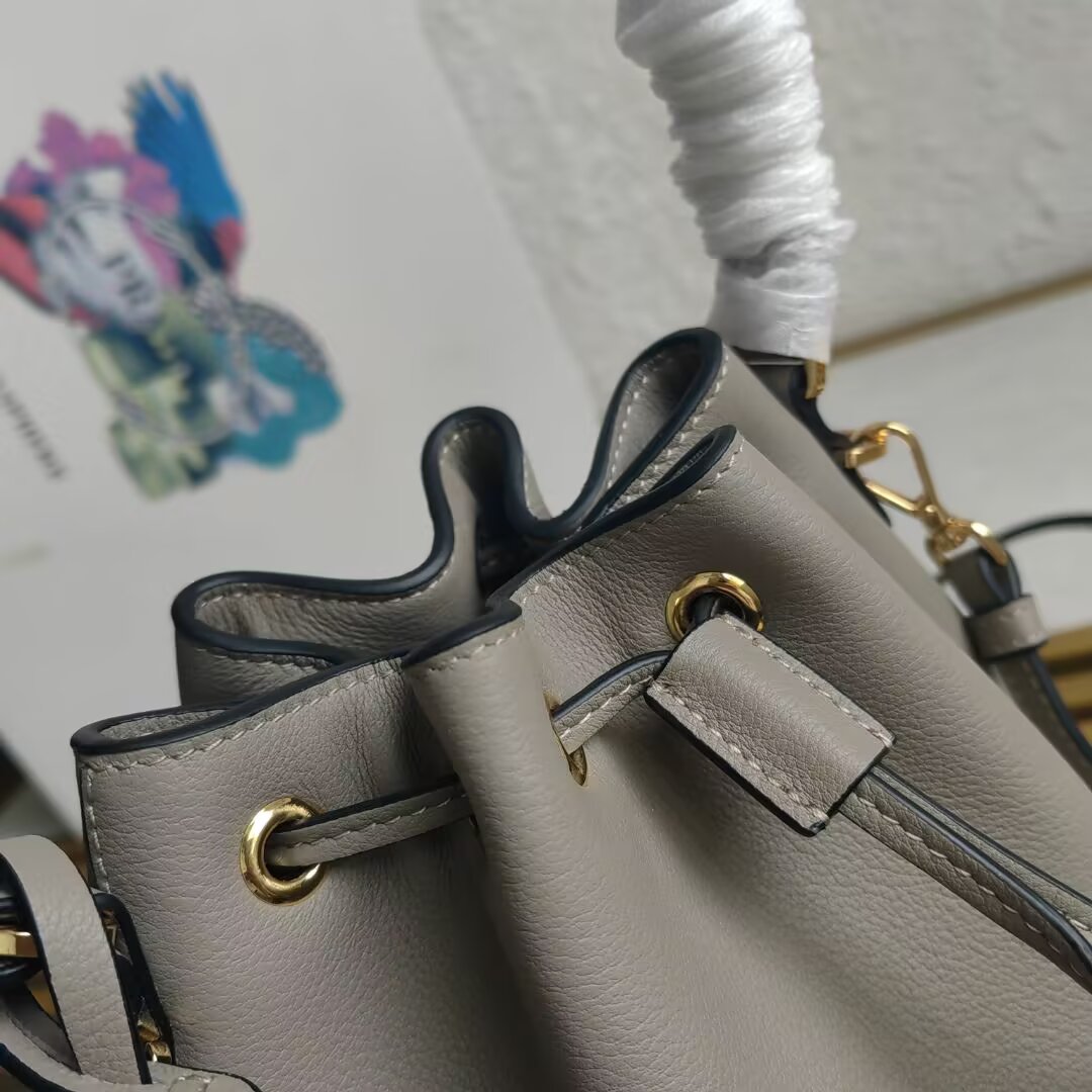 Prada Mini Bucket Bag with Adjustable Leather Strap - Stylish & Versatile 6 a1744351744623 1562