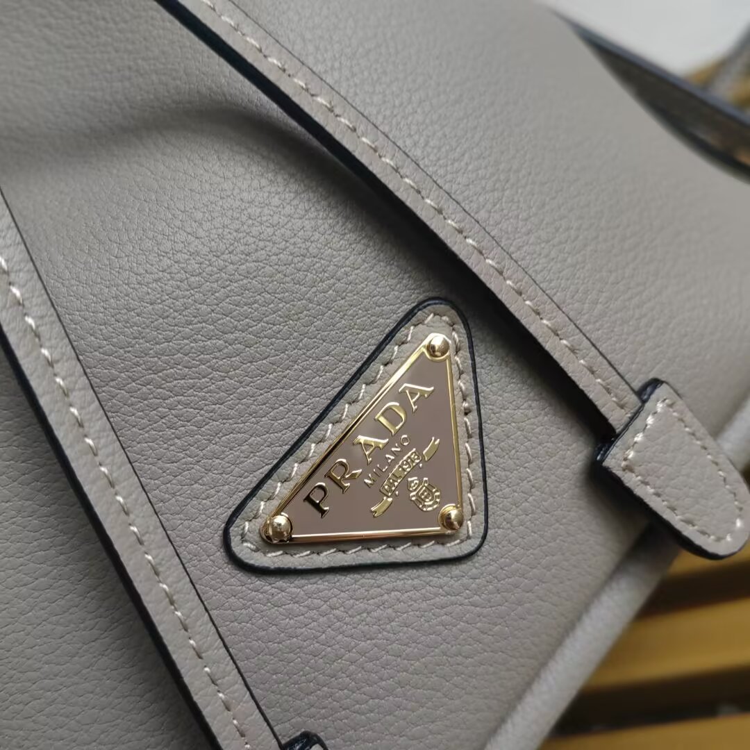 Prada Mini Bucket Bag with Adjustable Leather Strap - Stylish & Versatile 7 a1744351748725 1308