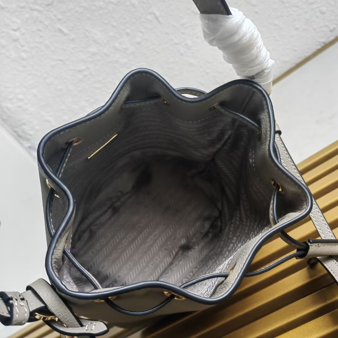 Prada Mini Bucket Bag with Adjustable Leather Strap - Stylish & Versatile 9 a1744351748726 5027