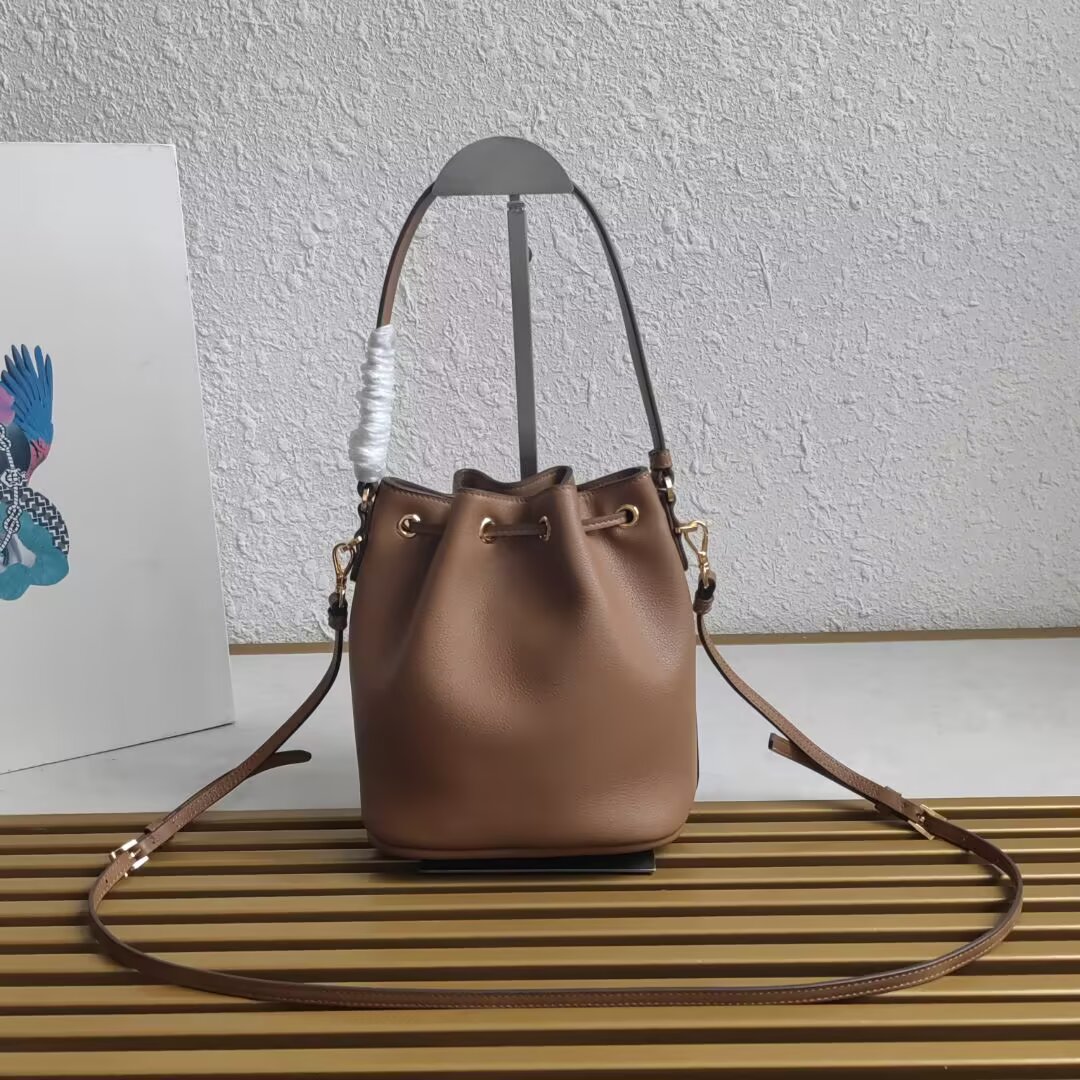 Prada Mini Bucket Bag in Leather with Adjustable Shoulder Strap 3 a1744351992880 8654