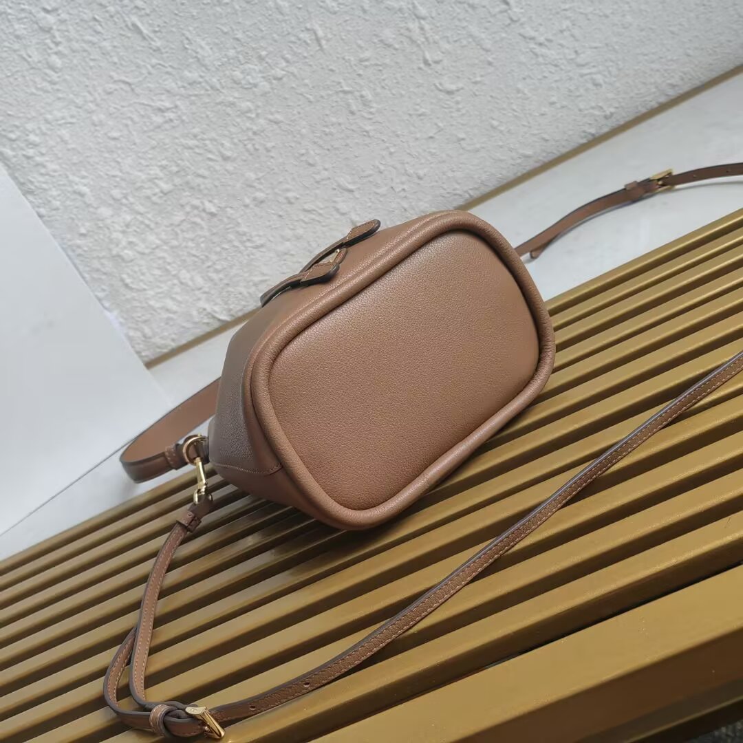 Prada Mini Bucket Bag in Leather with Adjustable Shoulder Strap 4 a1744351992894 5022