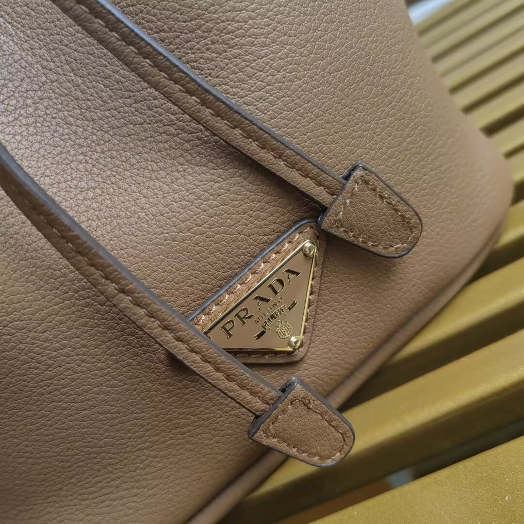 Prada Mini Bucket Bag in Leather with Adjustable Shoulder Strap 7 a1744351997806 2538