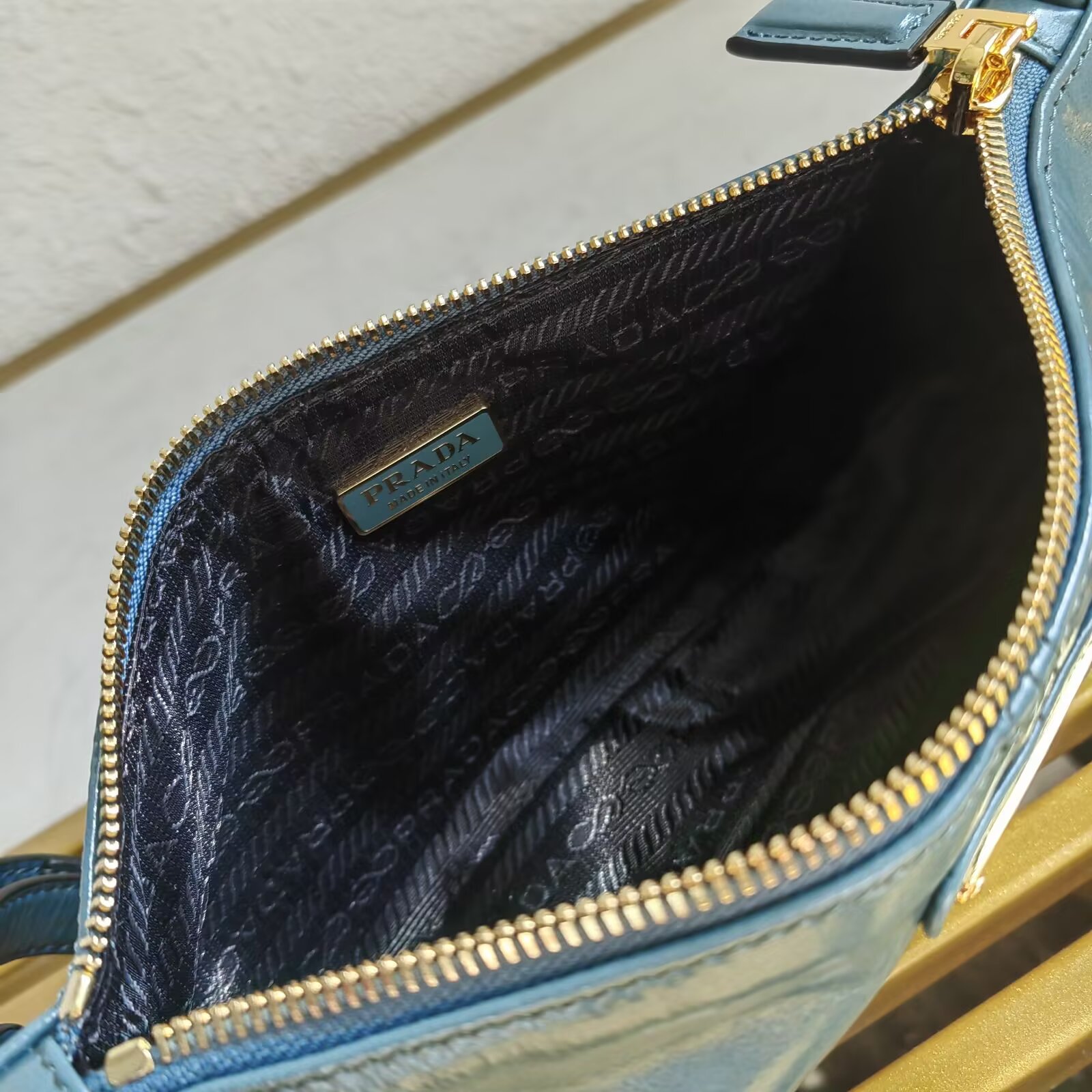 Prada 2002 Re-Edition Shoulder Bag in Oil Wax Leather with Chain Strap 9 a1744959309315 4123
