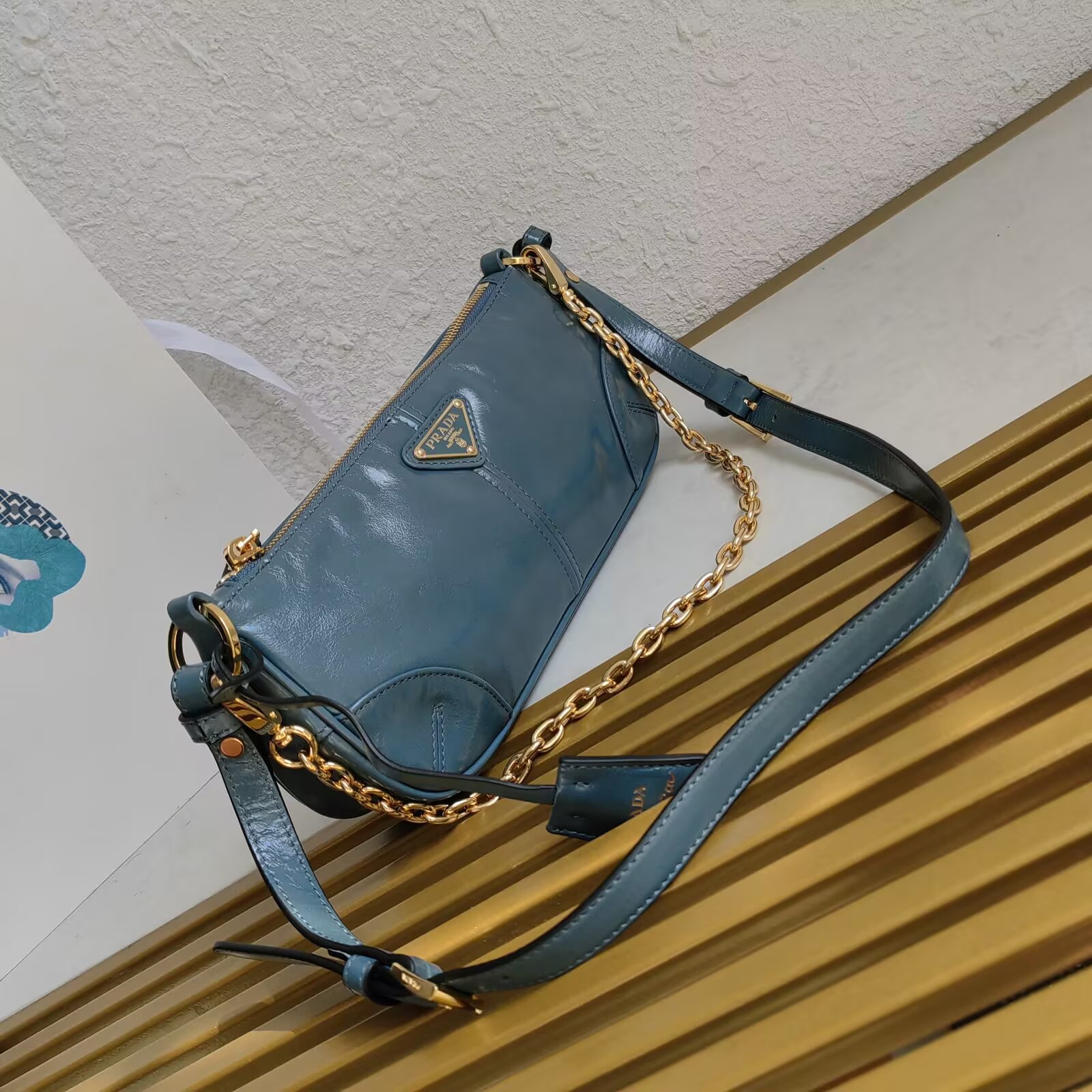 Prada 2002 Re-Edition Shoulder Bag in Oil Wax Leather with Chain Strap 3 a1744959318975 8617