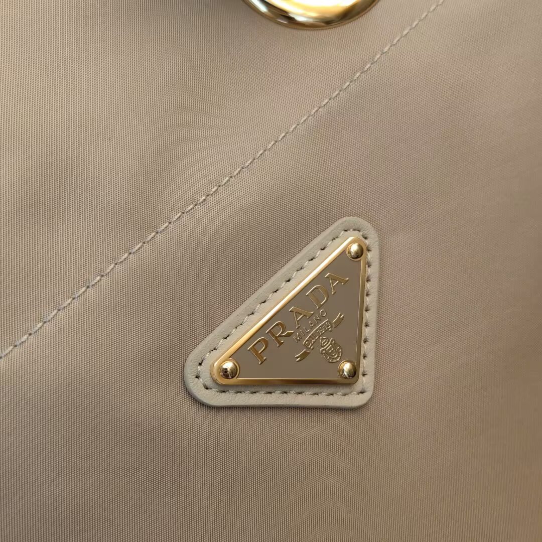 Prada Beige Nylon Bucket Bag with Rope Handle | 1BE082 Show Collection 7 a1745211815341 2848