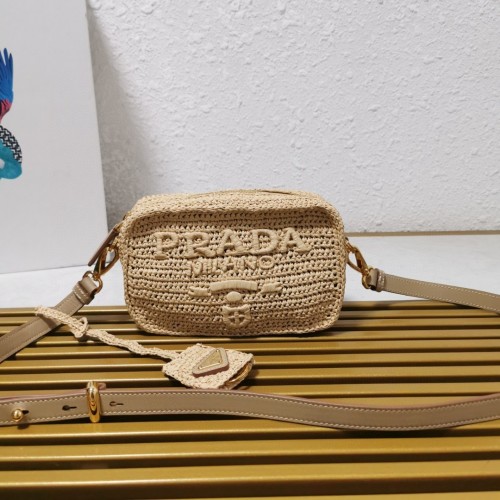 Prada Raffia Camera Bag - A Summer Essential, 20x13x7cm, Adjustable Strap 1 Prada Raffia Camera Bag - A Summer Essential, 20x13x7cm, Adjustable Strap