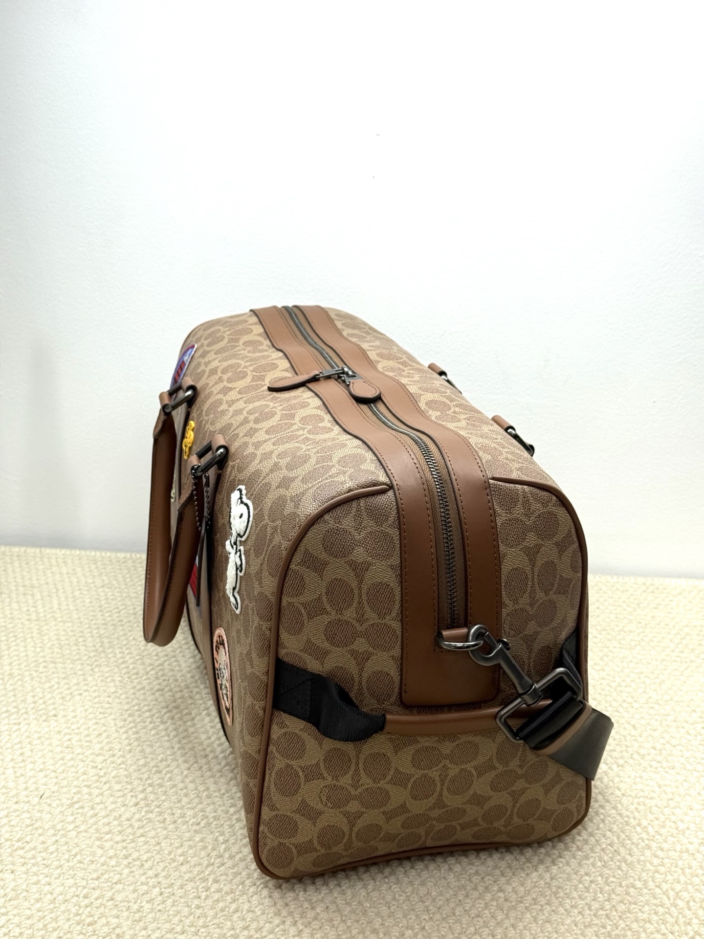 Coach coach新品史努比联名大容量旅行袋：CBl42