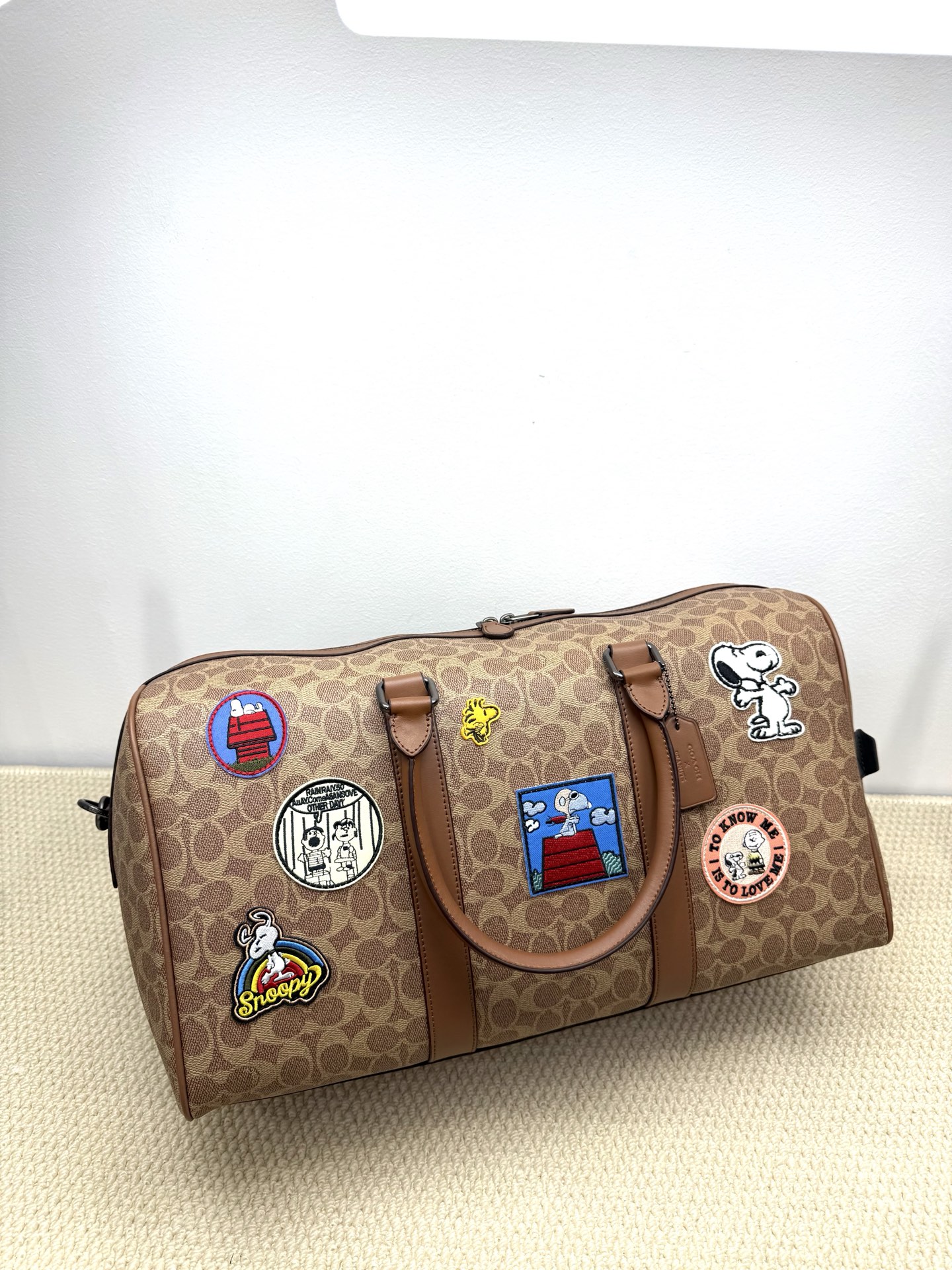 Coach coach新品史努比联名大容量旅行袋：CBl42