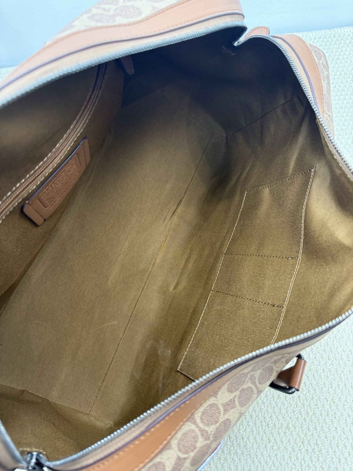 Coach coach新品史努比联名大容量旅行袋：CBl42