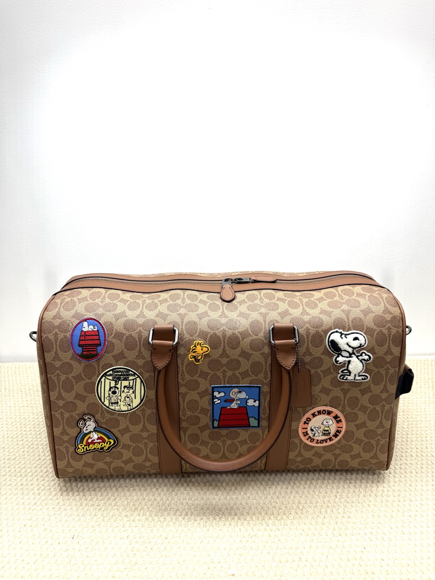 Coach coach新品史努比联名大容量旅行袋：CBl42