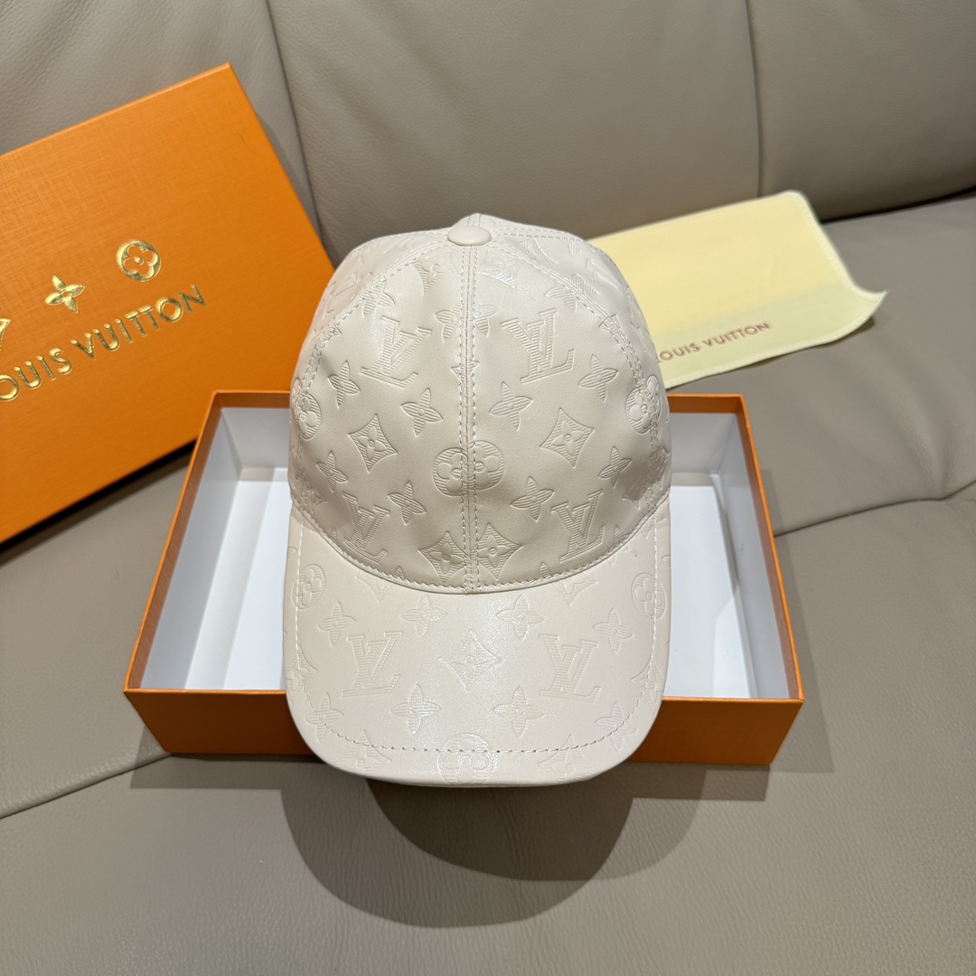 Front view of a premium leather baseball cap with embossed floral design