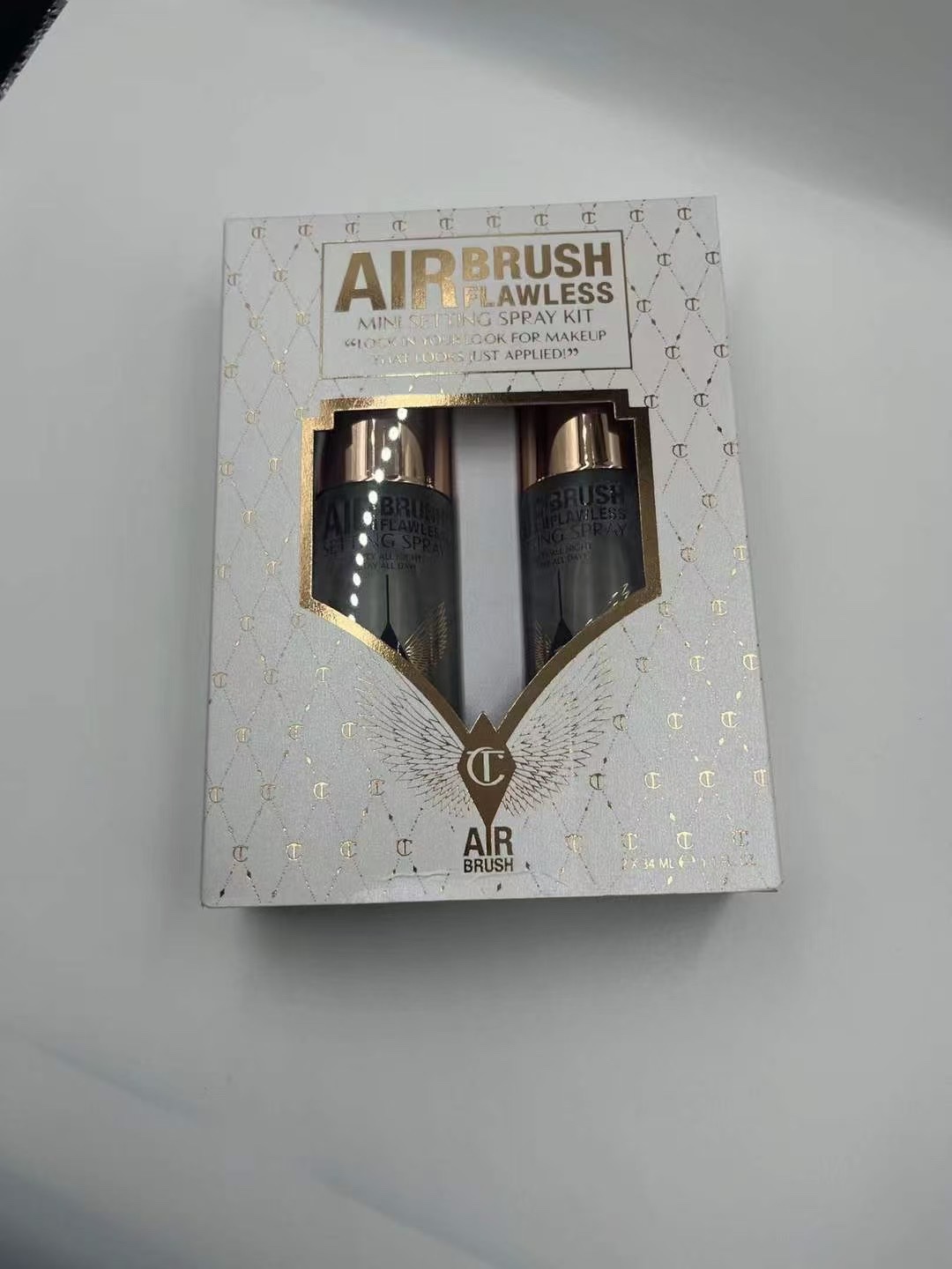 ¡Set de dos piezas de spray fijador de maquillaje CT! Incluye: 34ml*2.