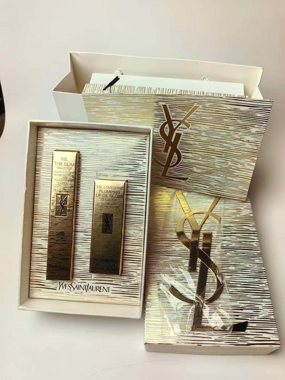 YSL Luxurious Gold Lipstick and Lip Gloss Two-Piece Set! Shades: Mini Gold 1936, Bobo Lip Gloss 12.