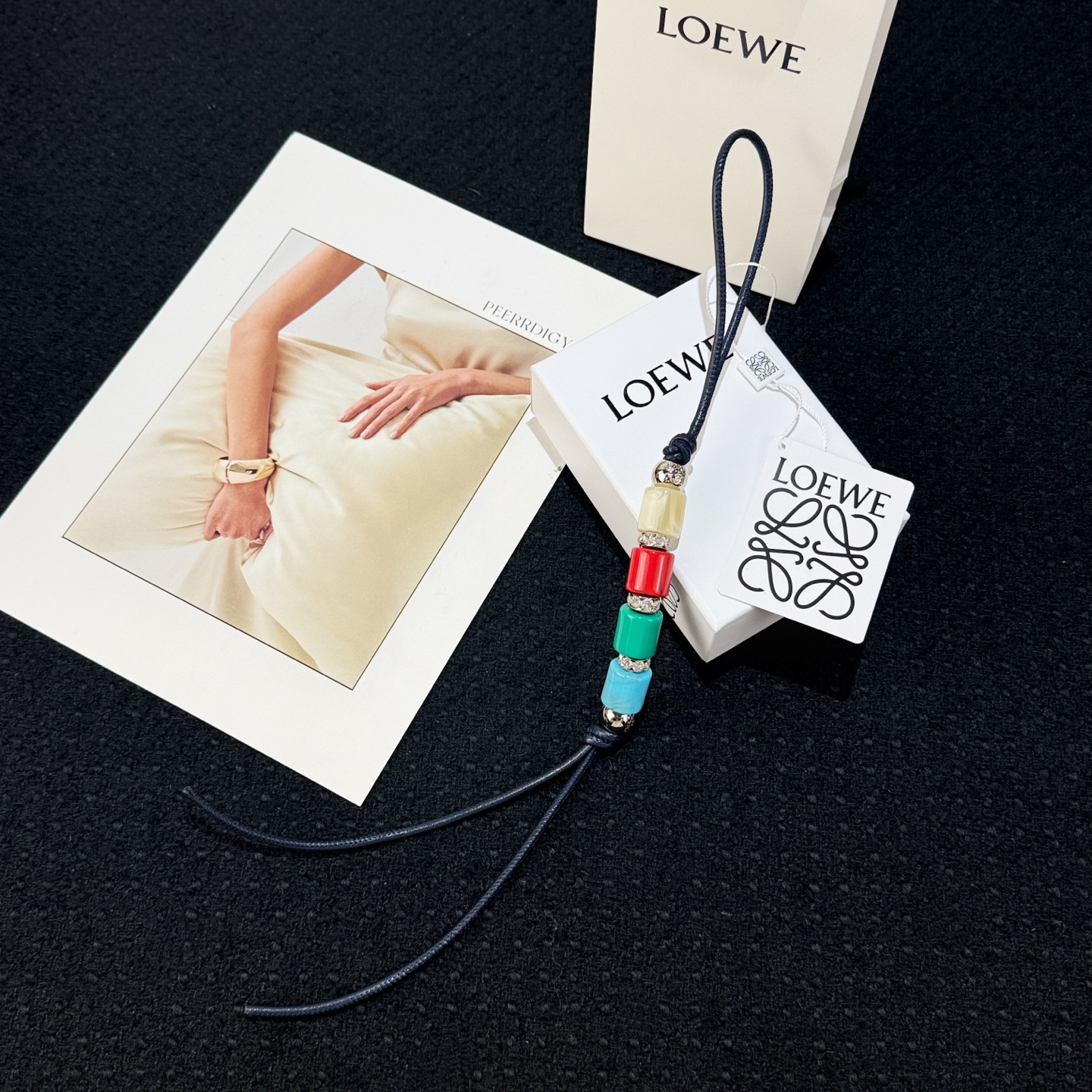 NO:617247,New product Loewe cow leather colorful beaded pendant/pendant, decorated with cow leather straps and Anagram dice. Made of imported calf leather and can be hung on bags. Its cute and cute shape makes people fall in love with it.,loewe,loewe,cowhide19860909新品 罗意威Loewe 牛皮革彩色串珠挂饰/挂件 饰有牛皮革环带和Anagram骰子. 采用进口小牛皮 可挂于包包,其萌趣、可爱的造型,让人爱不释手,,loewe,loewe,cowhide,accessory