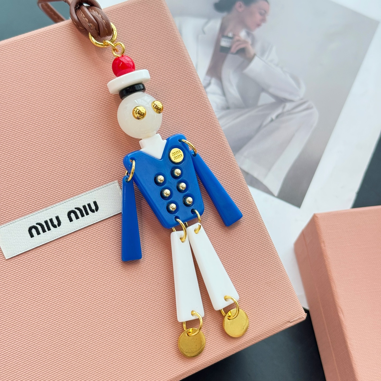 Miu Miu Robot Charm: Leather Bag Accessory with Metal Logo Detail
