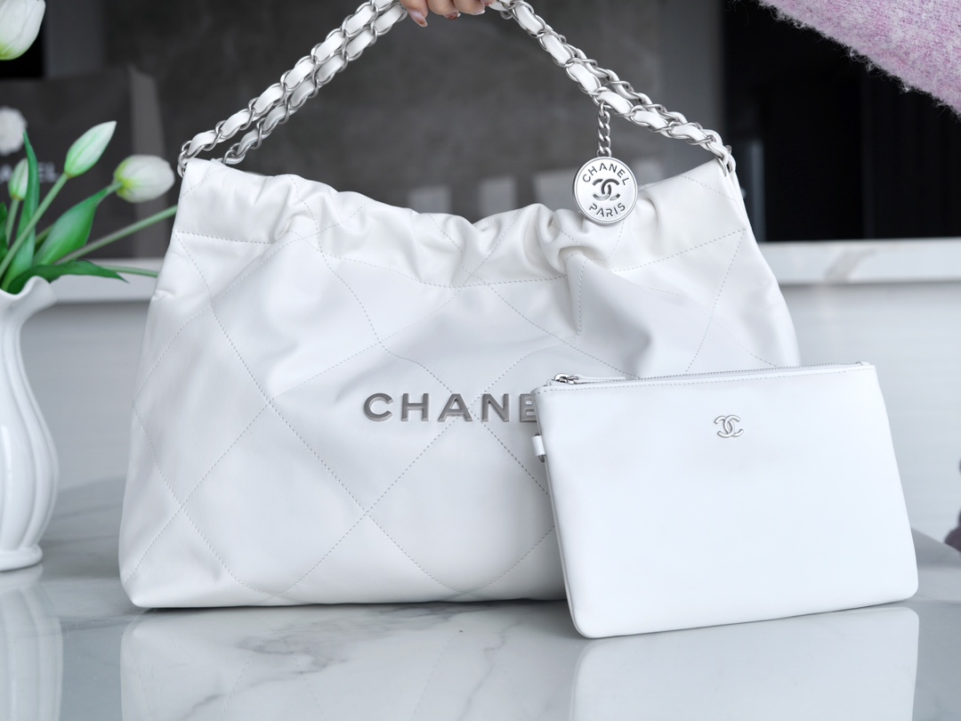 Fashion Designer
 Chanel Handbags Crossbody & Shoulder Bags White Openwork Silver Hardware Vintage