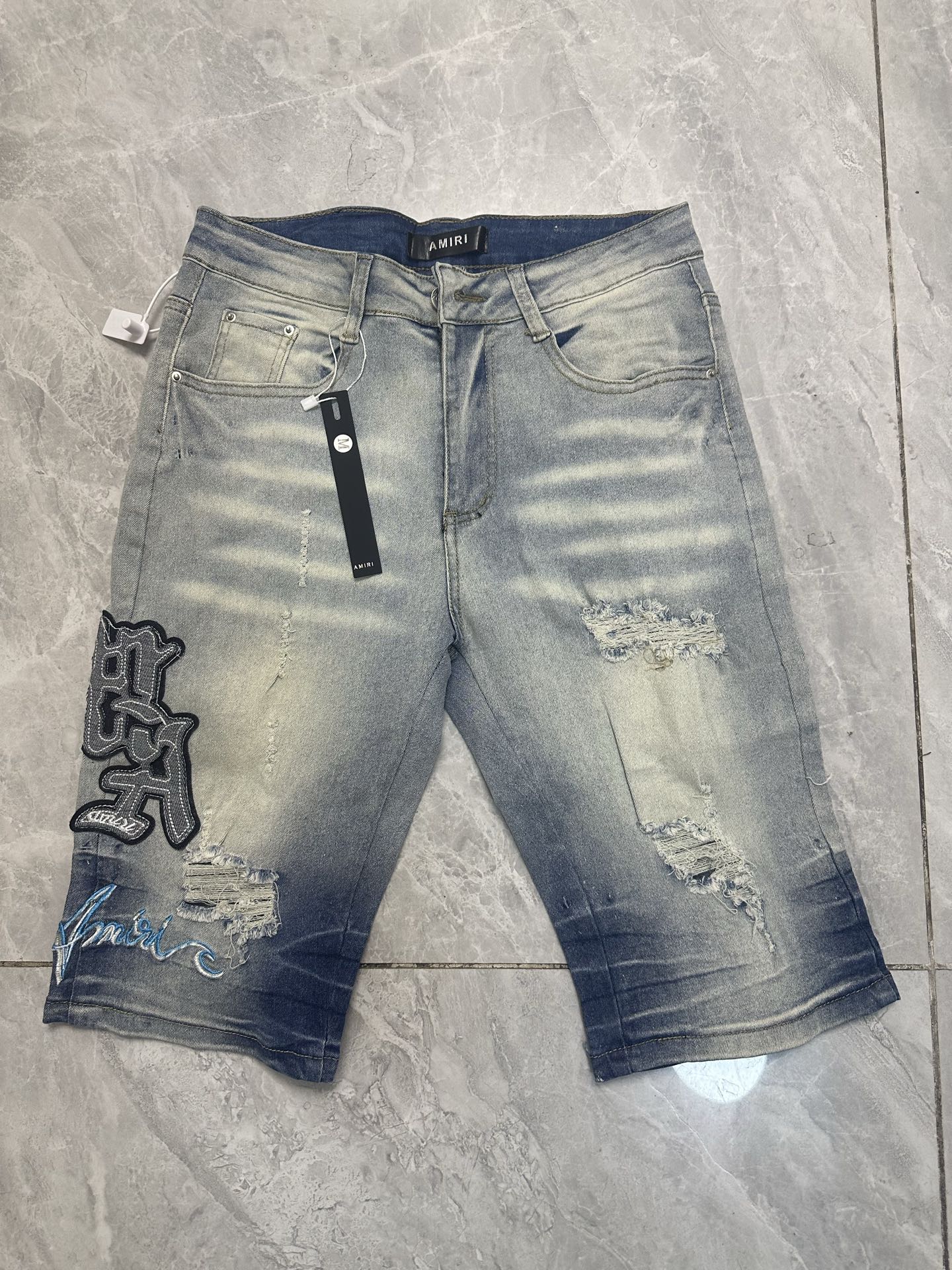 High Street Men’s Fashion Trends: Oversized AMIRI Cowboy Shorts and FOG Queen Styles - 图片 8
