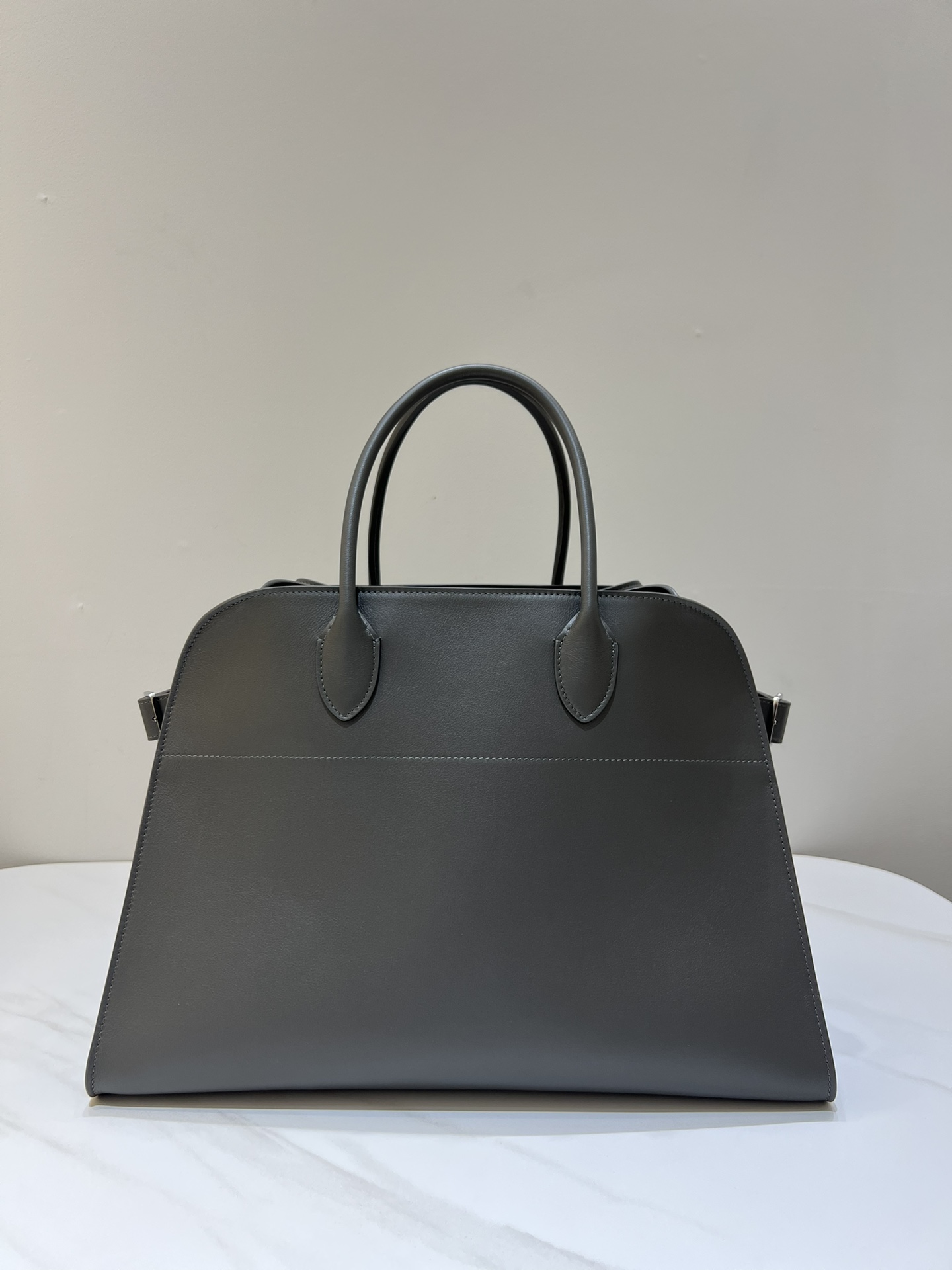 THE ROW TR Margaux 15 Handbag Grained Calfskin Trapezoid Strap