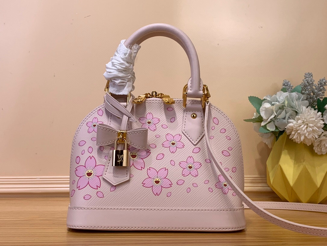 NO:551038,Top original item [LV × TM Alma BB Handbag] m13104 Pink/Sakura (Takashi Murakami) Created by Japanese artist Takashi Murakami, the brightly colored Maison icon bag 'LV × TM ALMA' is updated with the cheerful cherry blossom pattern that symbolizes regeneration.  BB”.St adds gold hardware to Ei leather in soft pink tones to create a sophisticated impression. You can enjoy various holding styles with a Tron handle and a detachable leather strap, and the interior can store daily items including a large smartphone. Size 23.5 x 17.5 x 11.5 cm 7318085,, louis vuitton19860909顶级原单【LV × TM Alma BB 手袋】m13104 粉色/樱花（村上隆） 日本艺术家 村上隆创作的,以象征再生的欢快的樱花图案更新的色彩鲜艳的Maison的图标包“LV × TM ALMA BB”.St在柔和的粉色色调的Ei皮革上加上金色的金具,营造出精致的印象.用Tron手柄和可拆卸的皮革表带可以享受各种握持方式,内部装修可以收纳以大智能手机为首的日常 尺寸23.5 x 17.5 x 11.5厘米 7318085,,louis vuitton,Bag