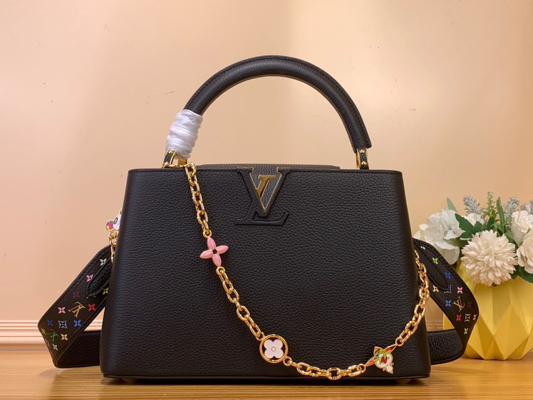 NO:551719,Top original order [LV x TM caucines medium handbag] m13878 black/Takashi Murakami shows the light charm of Louis Vuitton X  The Hr Murakami collection reinterprets this season's signature and presents House's iconic Capuchin handbag in Torrian leather. Golden hardware such as the emblematic LV initials, a detachable chain strap decorated with Monogram flowers, and a cheerful panda character embodied in the super flat style characteristic of Japanese artist Takashi Murakami. The multi-color Monogram pattern adds vibrant dots to the strap and lining. Dimensions 31.05 x 20 x 11 cm  143151550 (length x height x width),,louis vuitton,louis vuitton19860909顶级原单【LV x TM caucines 中号 手袋】 m13878 黑色/村上隆 在展现轻快魅力的路易威登X Hr村上系列中,重新诠释了本季的签名,展示了豪斯的标志性卡普辛手提包.托里昂皮革材质.象征性的LV首字母,装饰Monogram花的可拆卸链条带,日本艺术家村上隆特有的超级扁平风格体现的愉快的熊猫角色等金色的硬件.在表带和内衬上增加充满生机的点的多色Monogram图案. 尺寸31.05 x 20 x 11厘米 143151550（长x高x宽）,,louis vuitton,louis vuitton,Bag