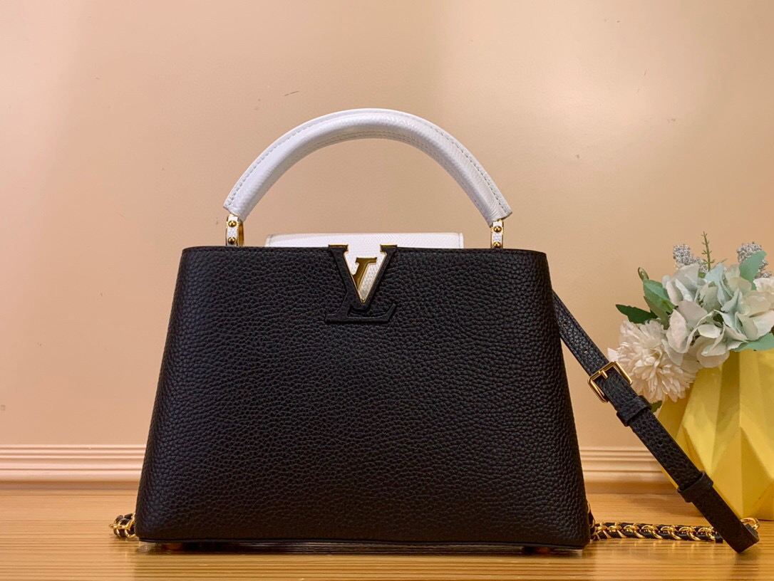 NO:551922,Top original order [CAUCINES small handbag] N85829 85830 48865 black / cowhide with lizard pattern (chain) This Caucines small handbag is dip-dyed with Taurillon jw leather in a bright and bright color, which contrasts with the calm handle ring. The iconic flip cover of the Caucines series provides two styles of external style to reveal a simple style, and the inner buckle highlights the LV letters. Size 27*  18* 9 cm 125121350,,louis vuitton,cowhide19860909顶级原单【CAUCINES 小号 手袋】N85829 85830 48865 黑色 / 牛皮拼蜥蜴纹（链条） 本款 Caucines 小号手袋为 Taurillon jw皮革浸染灵动亮彩,与色调沉稳的手柄环互为映衬.Caucines 系列标志性翻盖提供两式风尚外置流露简约格调,内扣彰显 LV 字母. 尺寸27* 18* 9 cm 125121350,,louis vuitton,cowhide,Bag