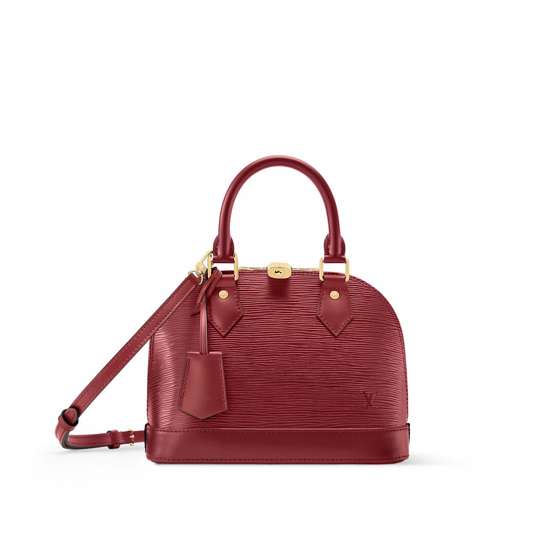 NO:552461,Top original item [Sac Alma BB] m25562 Maroon/Water Ripple The iconic Alma BB bag is revisited in this red Monogram Ei Bl leather version, inspired by Louis Vuitton lipstick. The gold metal finish enhances the grain effect and includes a padlock and key bell. This model comes with an internal flat pocket for small personal items and can store daily essentials. The shoulder strap is removable and can be carried in the hand. Dimensions 23.5 x 17.5 x  11.5cm.6517075(lengthxheightxwidth),,louis vuitton19860909顶级原单【Sac Alma BB】 m25562 枣红色 /水波纹 标志性的Alma BB包在这款红色Monogram Ei Bl皮革版本中重温,灵感来自路易威登口红.金色金属饰面增强了颗粒效果,包括挂锁和钥匙铃.该型号配有一个内部扁平口袋,可以存放小个人物品,可以存放日常必需品.肩带是可拆卸的,可以拿在手里. 尺寸23.5 x 17.5 x 11.5厘米.6517075（长度x高度x宽度）,,louis vuitton,Bag