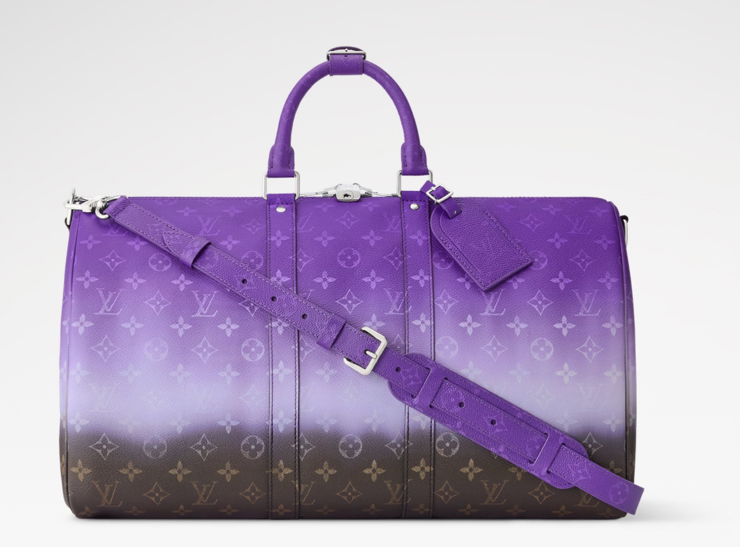 NO:763064,[Sac Keeall 45 Travel Bag] m28404 Purple Gradient Monogram Pigment Canvas pushes the limits of traditional ebony letters and injects bold color into this Keeall shoulder bag 45. The gradient saturates the upper part and then fades towards the base. The cowhide leather facing, upper handle and removable and adjustable shoulder strap are colored in the brightest hue. Dimensions 45x27x20 cm (LxHxW),,shoulder bags,cowhide19860909【Sac Keeall 45 旅行袋】m28404 紫色渐变 Monogram颜料帆布突破了传统乌木字母的极限,为这款Keeall单肩包45注入了大胆的色彩.渐变使上部饱和,然后向基部逐渐消失.牛皮饰面、上手柄和可拆卸和可调节的肩带以最明亮的色调着色. 尺寸45x27x20厘米（长x高x宽）,,shoulder bags,cowhide,Bag