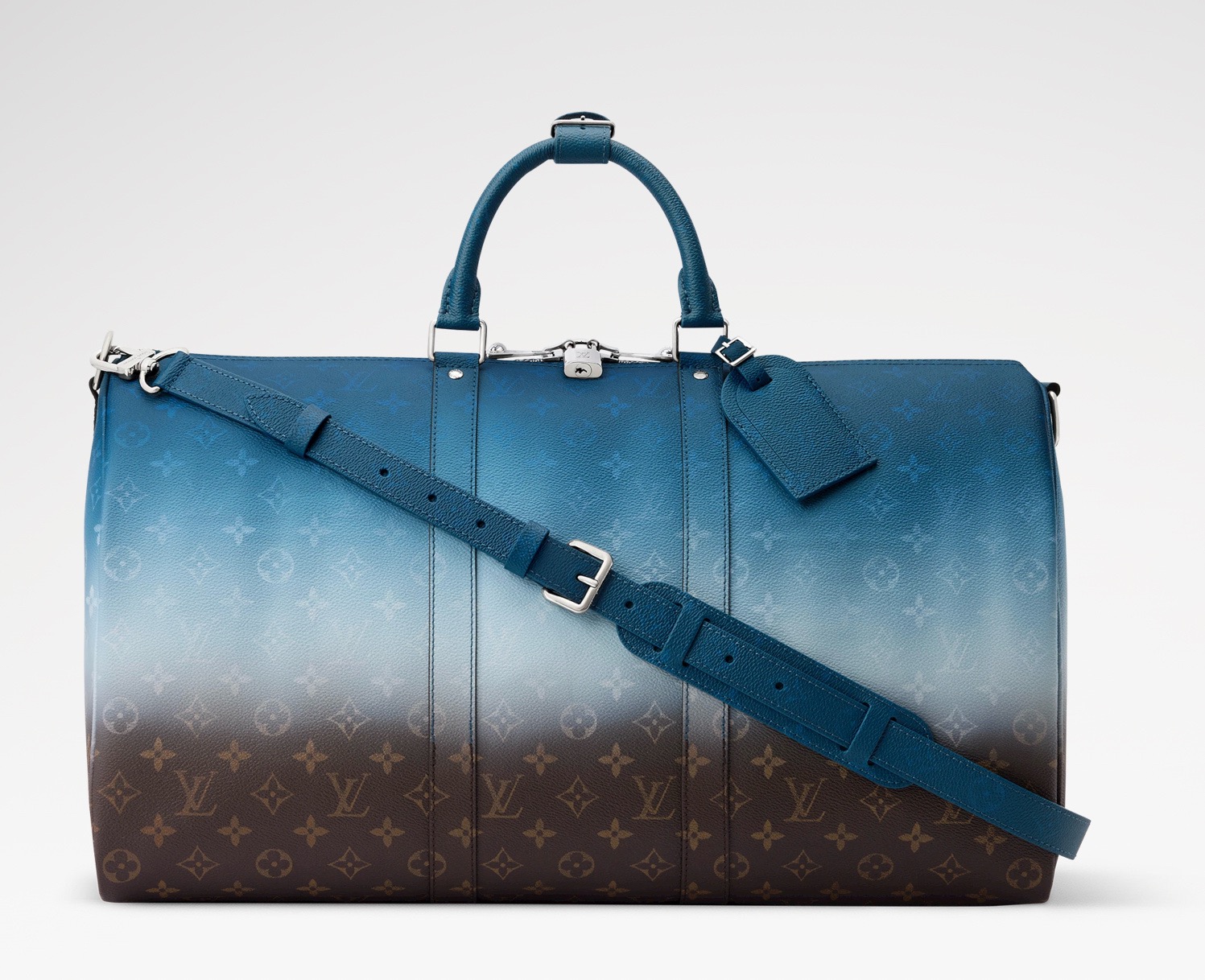 NO:851317,Top original order [LV  The pattern makes every detail reflect the gradient effect. The cowhide leather trim, top handle and detachable shoulder strap are all in the richer colors of the gradient. Dimensions 50 x 29 x 23 cm 6217075 (length x height x width),,louis vuitton,cowhide19860909顶级原单【LV X THE DARJEELING LIMITED KEEALL BANDOULIERE 50 手袋】 m28227 老花/蓝色（渐变） 本款 Keeall Bandoulière 50 手袋向印度明丽缤纷的织物材质汲取灵感,为 Monogram igment hr涂层帆布浸染欢愉色调.Monogram Ebene 图案则令每一处细节映现渐变效果.牛皮革饰边、顶部手柄与可拆卸肩带均取用渐变色调中较为浓郁的色彩. 尺寸50 x 29 x 23 厘米 6217075 (长度 x 高 x 宽),,louis vuitton,cowhide,Bag
