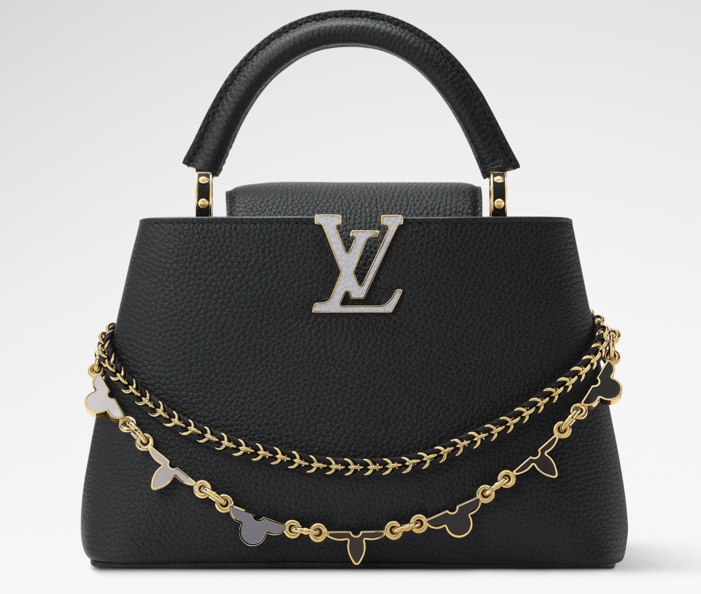 NO:938892,Top original order [CAUCINES BB handbag] M29608 black/enamel (macaron color) This Caucines BB handbag comes from the Flowergram series, reinterpreting Louis Vuitton's classic Flower Crown jw as decorative chain details. Each flower requires 3 hours of exquisite craftsmanship to assemble. Taurillon cow leather bag body embellished with LV  Letters and auxiliary chains, braided details sublimate the exquisite style. The double carrying configuration can accommodate daily needs, and the inner patch pocket is convenient for storing small items. Dimensions 13.6 x 21 x 8 cm.110121250 Dimensions 27 x 19 x 9 cm.120121350 (length x height x width),,louis vuitton,louis vuitton,cowhide19860909顶级原单【CAUCINES BB 手袋】M29608 黑色/珐琅（马卡龙配色） 本款 Caucines BB 手袋出自 Flowergram 系列,将路易威登经典 Flower Crown jw重新演绎为装饰链条细节,每朵花卉均需 3 小时精湛匠艺组装而成.Taurillon 牛皮革袋身点缀 LV 字母与辅助链条,编织细节升华工致格调.双重背携构型可容纳日常所需,内贴袋便于收纳小件物品. 尺寸13.6 x 21 x 8 厘米.110121250 尺寸27 x 19 x 9 厘米.120121350 (长度 x 高 x 宽),,louis vuitton,louis vuitton,cowhide,Bag