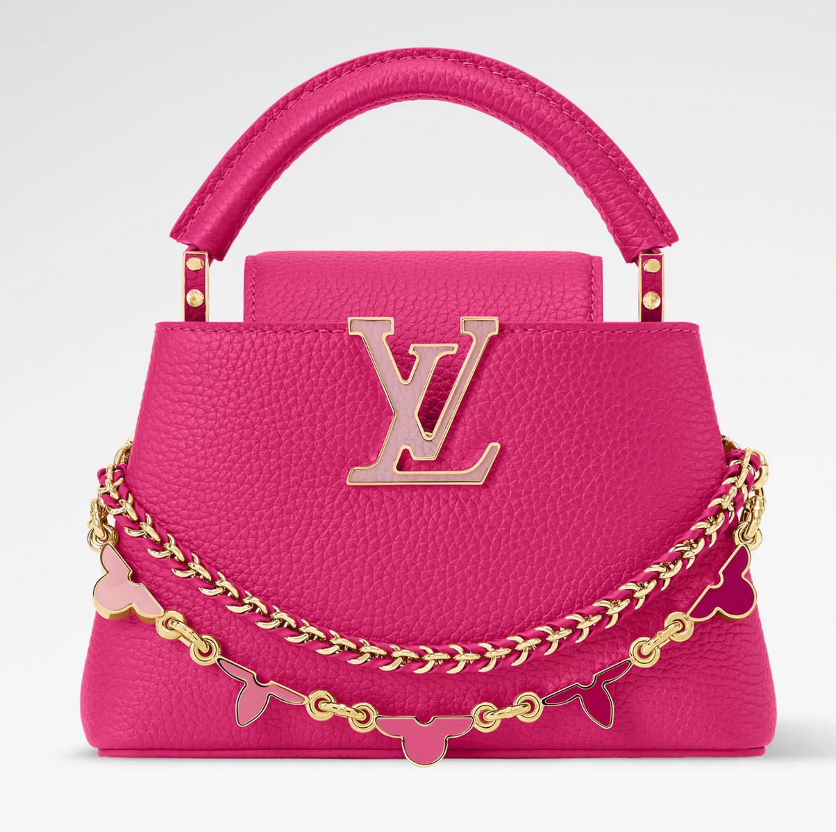NO:938909,Top original order [CAUCINES BB handbag] M29952 rose red/enamel (macaron color) This Caucines BB handbag comes from the Flowergram series, reinterpreting Louis Vuitton's classic Flower Crown jw as decorative chain details. Each flower requires 3 hours of exquisite craftsmanship to assemble. Taurillon cow leather bag body embellished with LV  Letters and auxiliary chains, braided details sublimate the exquisite style. The double carrying configuration can accommodate daily needs, and the inner patch pocket is convenient for storing small items. Dimensions 13.6 x 21 x 8 cm.110121250 Dimensions 27 x 19 x 9 cm.120121350 (length x height x width),,louis vuitton,louis vuitton,cowhide19860909顶级原单【CAUCINES BB 手袋】M29952 玫红/珐琅（马卡龙配色） 本款 Caucines BB 手袋出自 Flowergram 系列,将路易威登经典 Flower Crown jw重新演绎为装饰链条细节,每朵花卉均需 3 小时精湛匠艺组装而成.Taurillon 牛皮革袋身点缀 LV 字母与辅助链条,编织细节升华工致格调.双重背携构型可容纳日常所需,内贴袋便于收纳小件物品. 尺寸13.6 x 21 x 8 厘米.110121250 尺寸27 x 19 x 9 厘米.120121350 (长度 x 高 x 宽),,louis vuitton,louis vuitton,cowhide,Bag