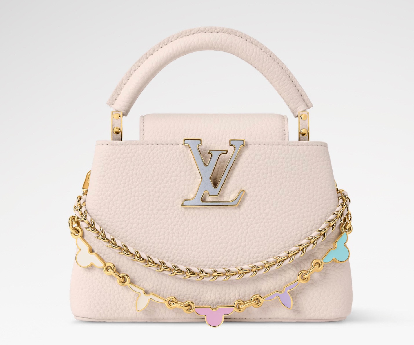 NO:938919,Top original order [CAUCINES BB handbag] M2A362/off-white (macaron color) This Caucines BB handbag comes from the Flowergram series, reinterpreting Louis Vuitton's classic Flower Crown jw as decorative chain details. Each flower requires 3 hours of exquisite craftsmanship to assemble. Taurillon cow leather bag body embellished with LV  Letters and auxiliary chains, braided details sublimate the exquisite style. The double carrying configuration can accommodate daily needs, and the inner patch pocket is convenient for storing small items. Dimensions 13.6 x 21 x 8 cm.110121250 Dimensions 27 x 19 x 9 cm.120121350 (length x height x width),,louis vuitton,louis vuitton,cowhide19860909顶级原单【CAUCINES BB 手袋】M2A362/米白色（马卡龙配色） 本款 Caucines BB 手袋出自 Flowergram 系列,将路易威登经典 Flower Crown jw重新演绎为装饰链条细节,每朵花卉均需 3 小时精湛匠艺组装而成.Taurillon 牛皮革袋身点缀 LV 字母与辅助链条,编织细节升华工致格调.双重背携构型可容纳日常所需,内贴袋便于收纳小件物品. 尺寸13.6 x 21 x 8 厘米.110121250 尺寸27 x 19 x 9 厘米.120121350 (长度 x 高 x 宽),,louis vuitton,louis vuitton,cowhide,Bag