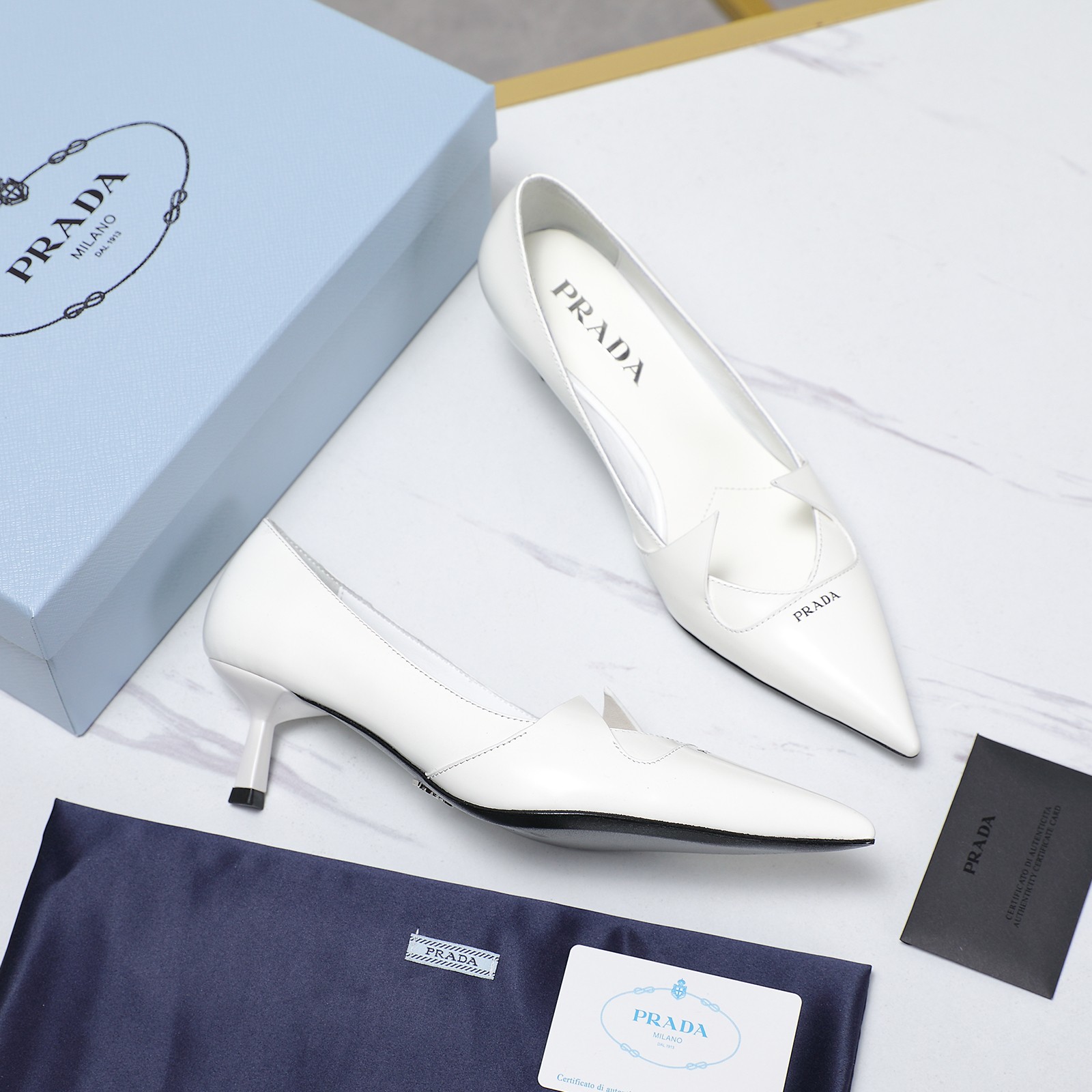 Prada Women's White Leather Pointed Toe Kitten Heel Pumps 3 a1740223523163 4181