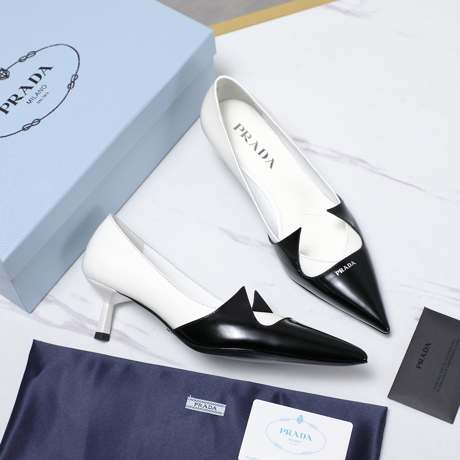 Prada Women's Two-Tone Leather Pointed Toe Kitten Heel Pumps 3 a1740223592727 3371