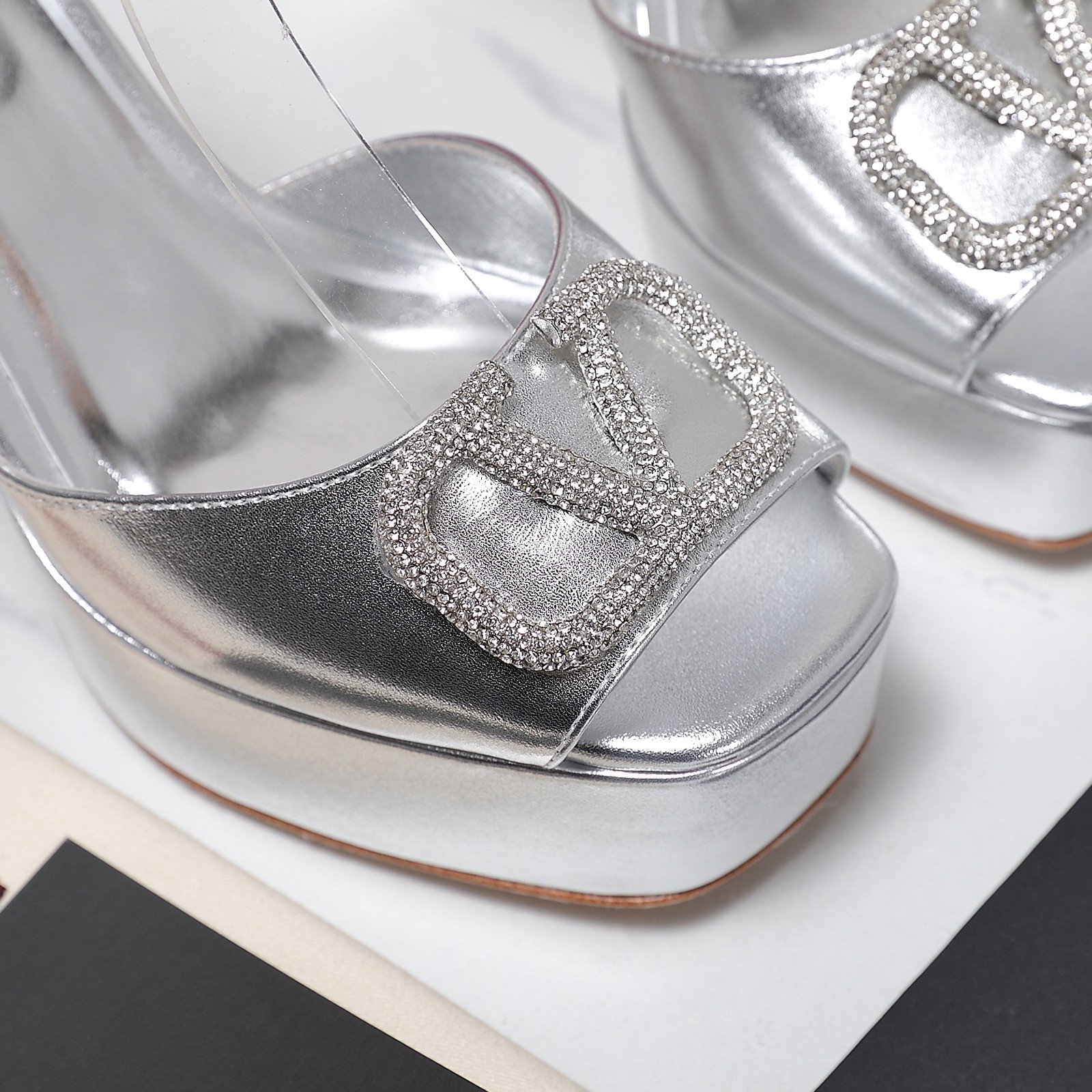 Valentino Metallic Platform Sandals with Crystal Embellished Logo 2025 4 a1741792442457 1111