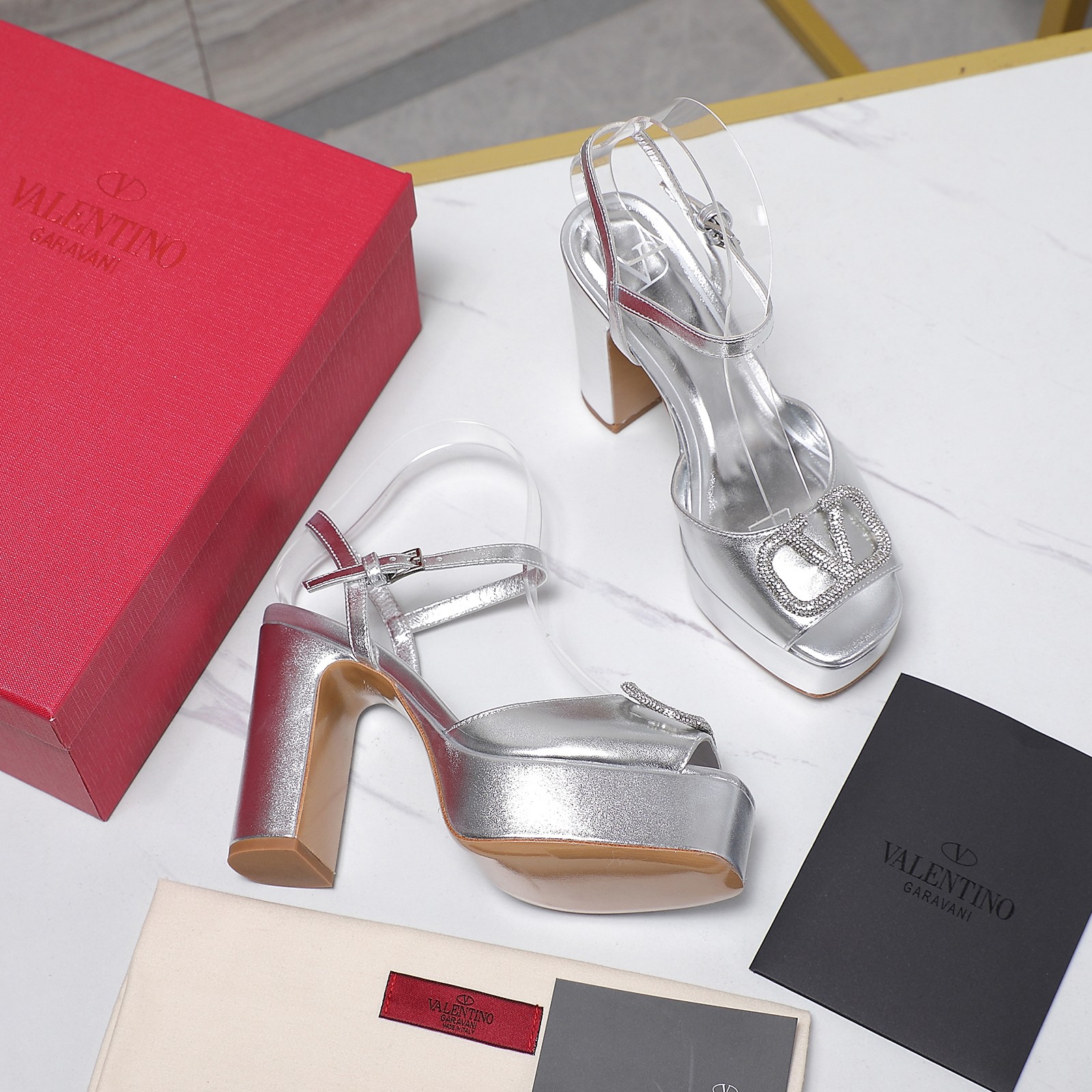 Valentino Metallic Platform Sandals with Crystal Embellished Logo 2025 10 a1741792446106 1376