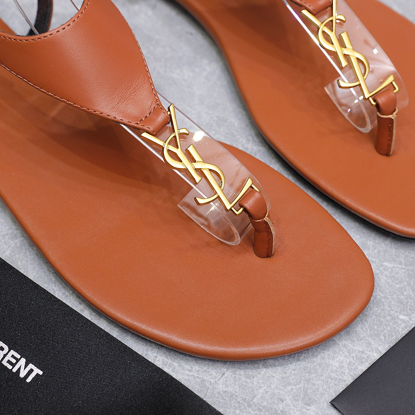 Saint Laurent Women's Brown Leather Thong Sandals with Gold Logo Accent 10 a1745067289608 8176