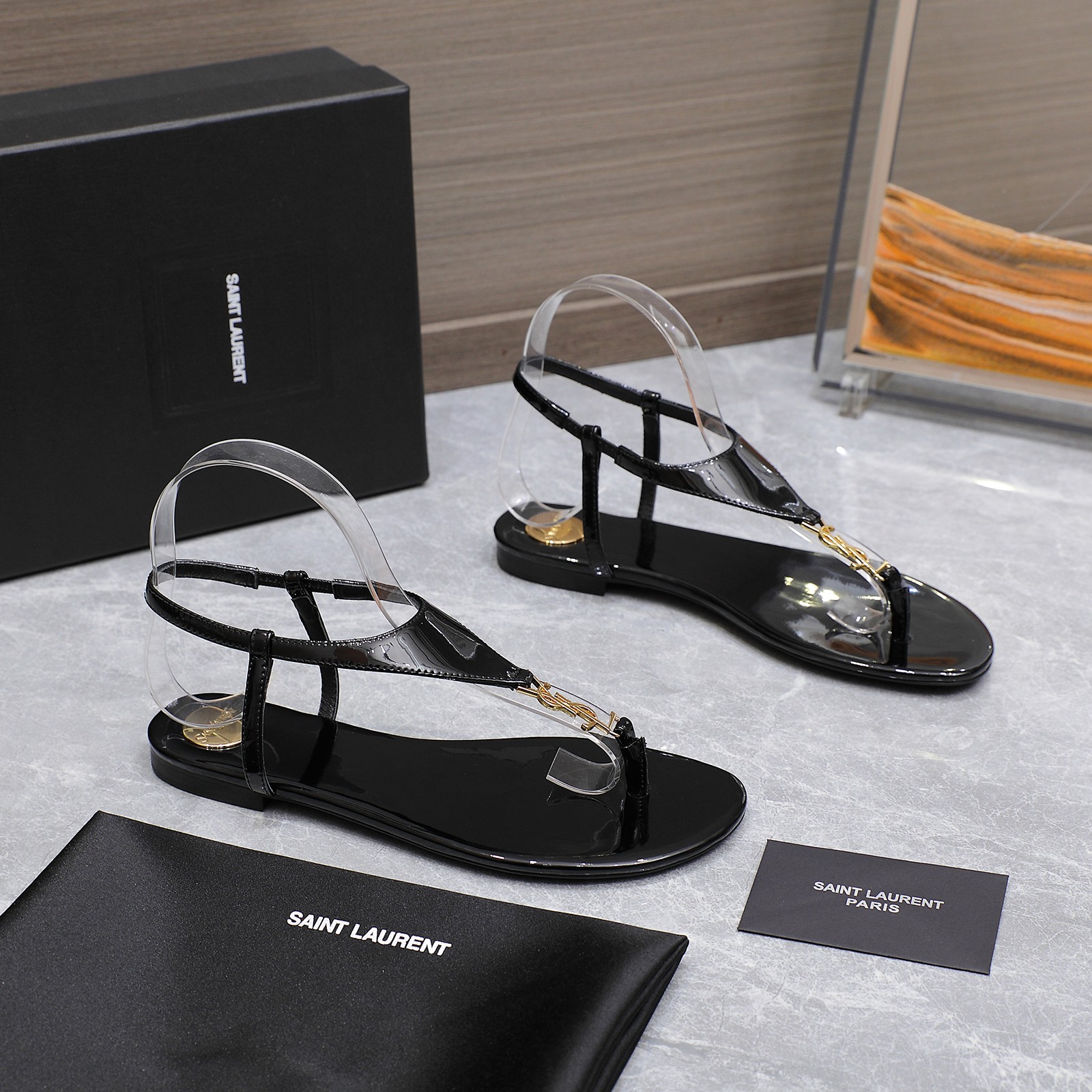 Saint Laurent Women's Cassandre Thong Sandals in Patent Leather Black 4 a1745067394424 3721