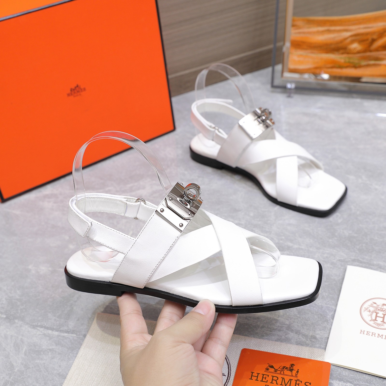Hermès White Leather Kelly Buckle Sandals Elegant Summer Footwear 1 Hermès White Leather Kelly Buckle Sandals Elegant Summer Footwear