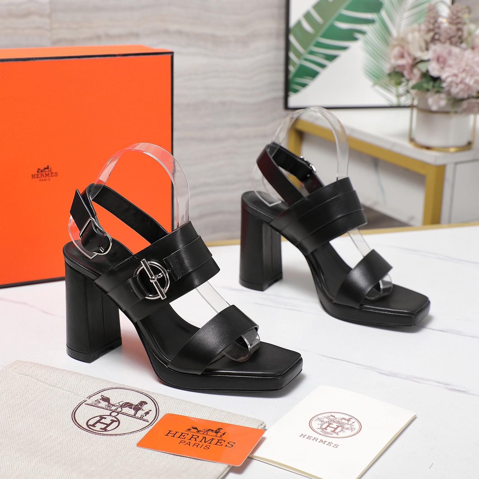 Hermès Women's Black Leather Heeled Sandals with Iconic Buckle 5 a1745241381628 5450