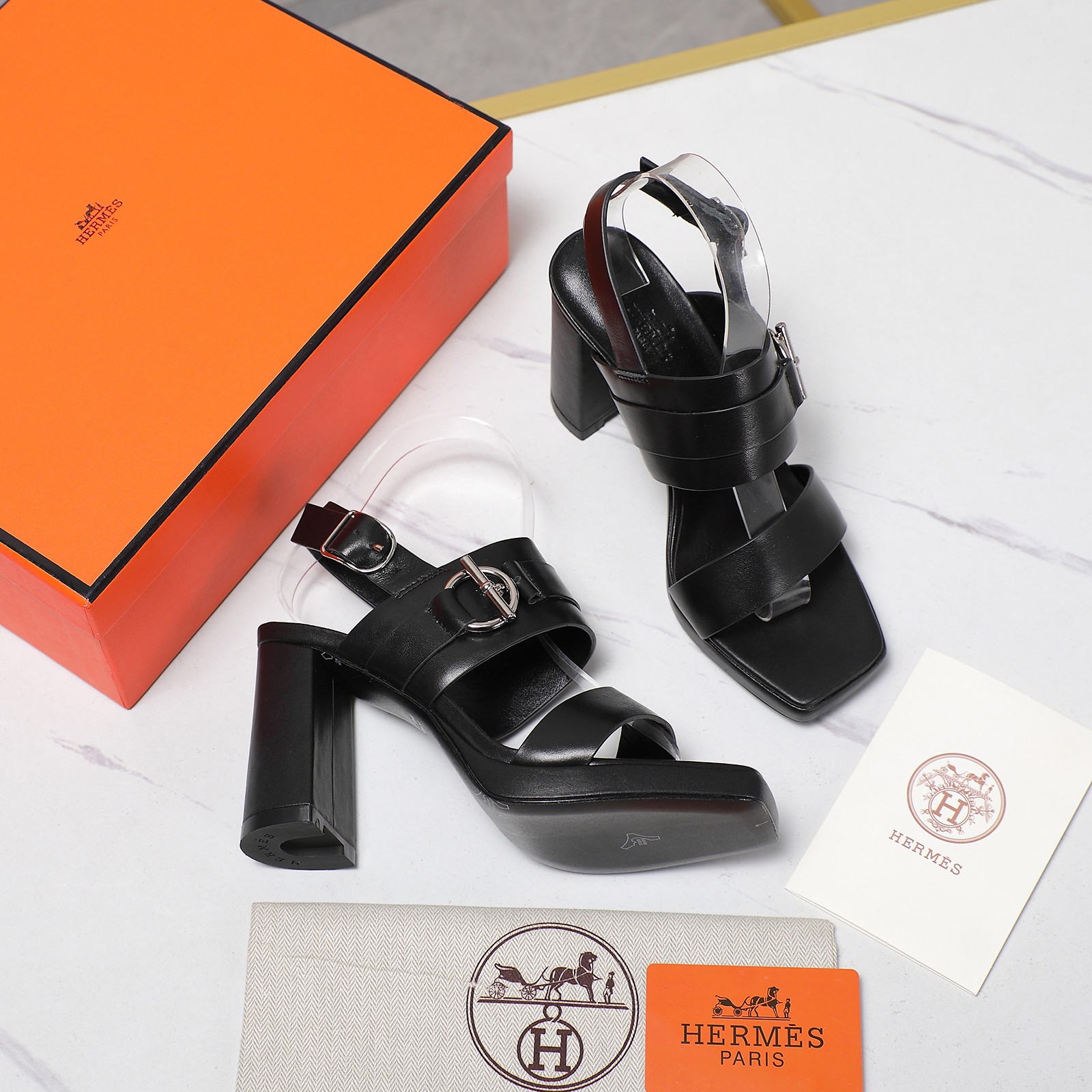 Hermès Women's Black Leather Heeled Sandals with Iconic Buckle 9 a1745241382654 5388