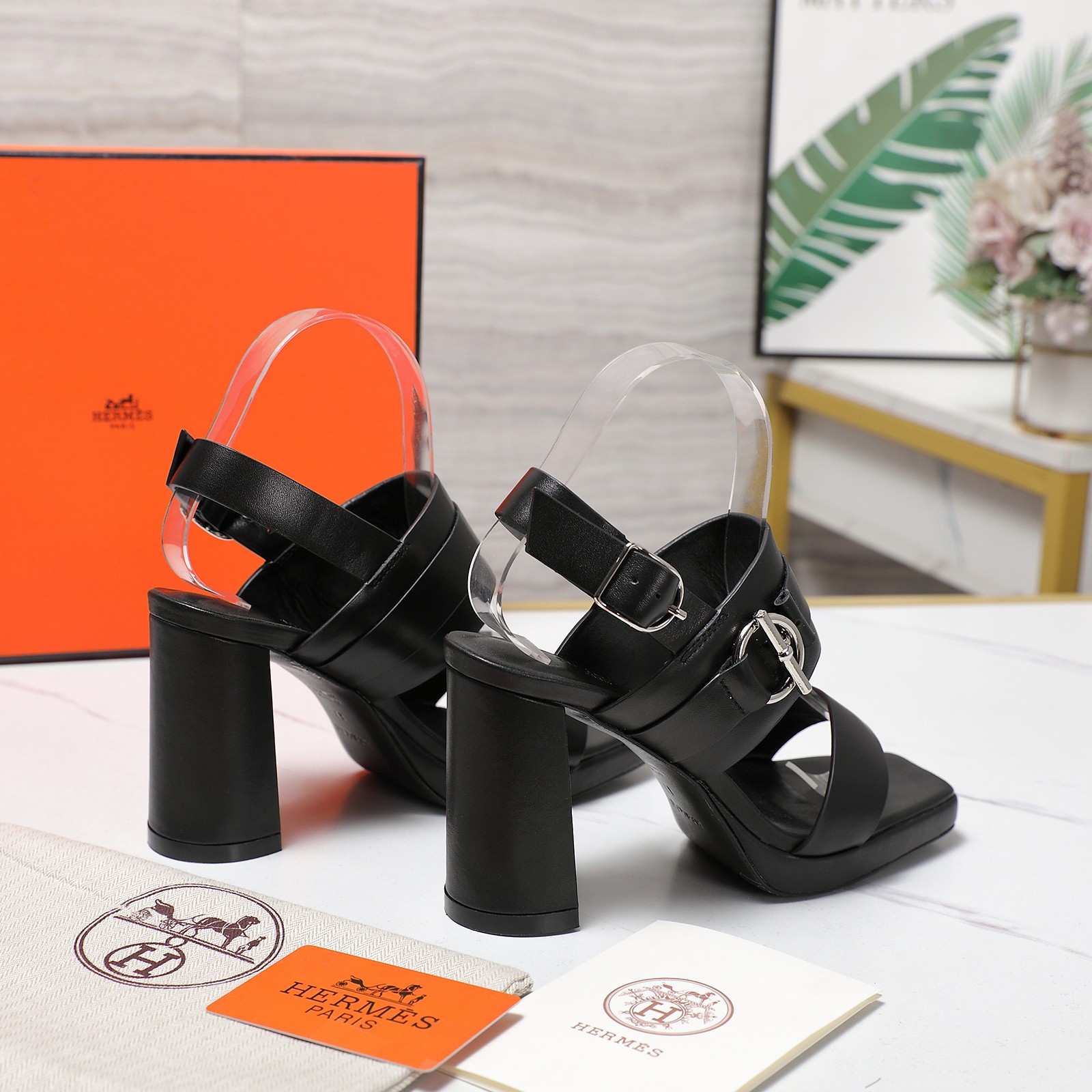 Hermès Women's Black Leather Heeled Sandals with Iconic Buckle 3 a1745241382654 7343