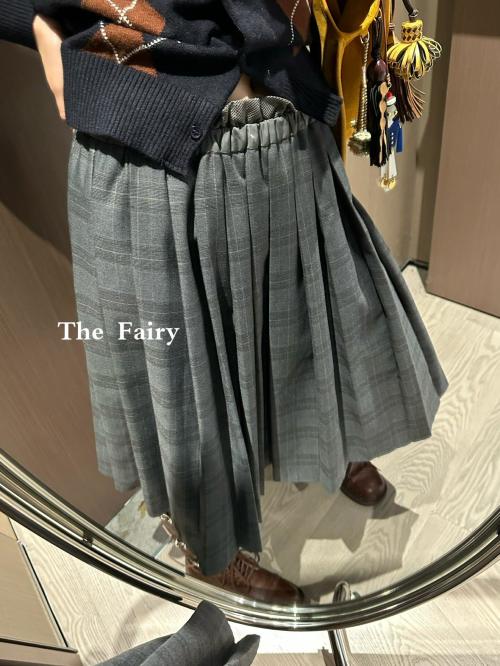 Miu Miu Prince of Wales Checkered Pleated Skirt with Logo Patch 1 Miu Miu Prince of Wales Checkered Pleated Skirt with Logo Patch