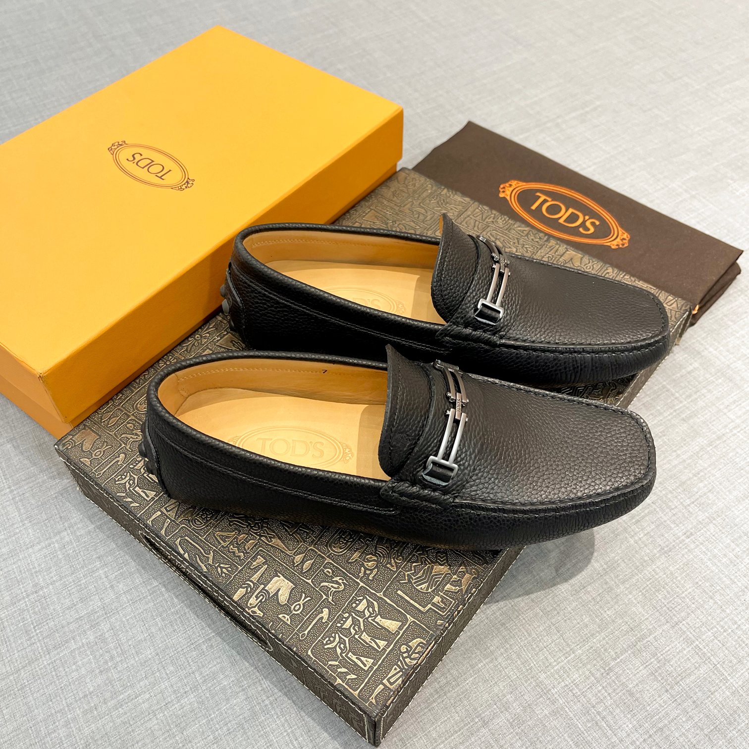 Precio de fábrica: [Tods] zapatos de hombre de soja Sincronización de contador nueva calidad de gama